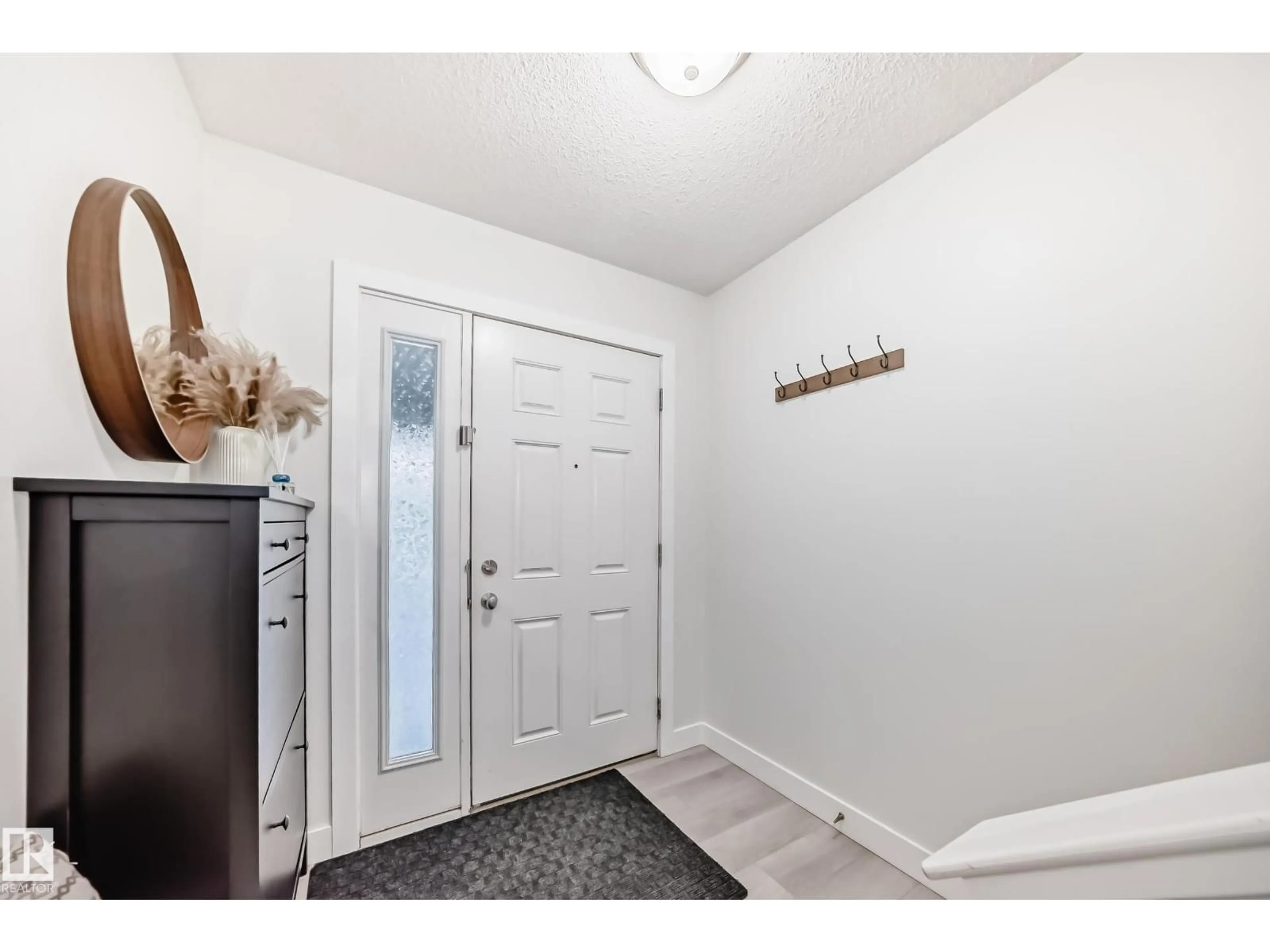 Indoor entryway for #47 - 12050 17 AV, Edmonton Alberta T6W1X4