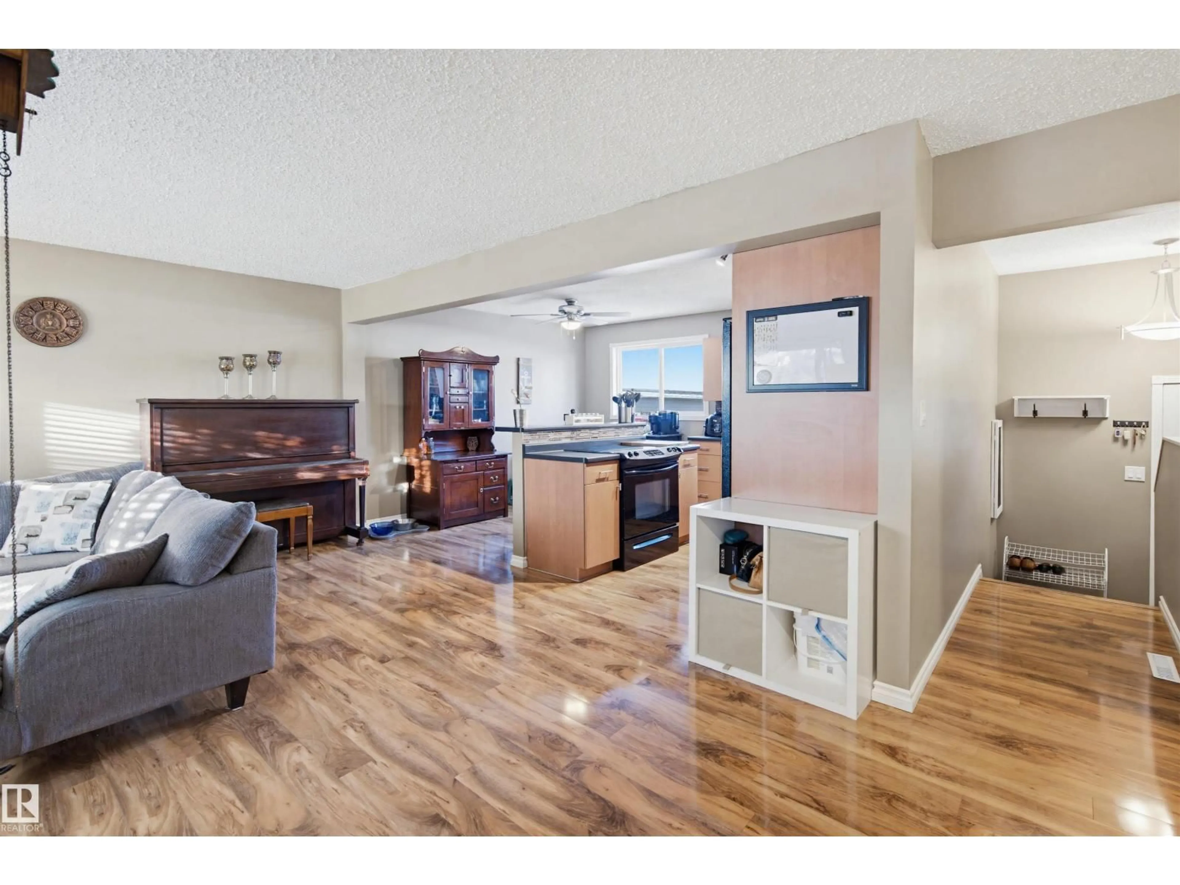 Open concept kitchen, wood/laminate floor for 3426 120 AV, Edmonton Alberta T5W1K2