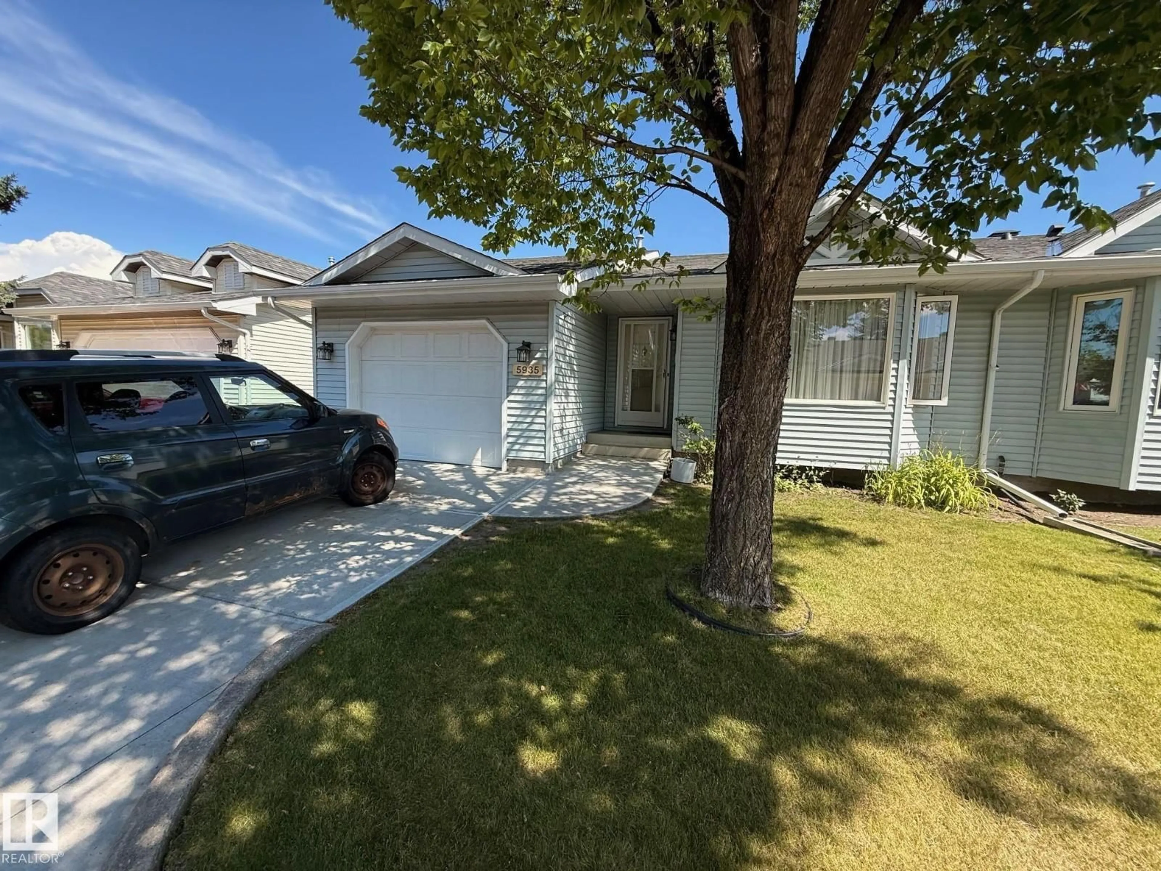A pic from outside/outdoor area/front of a property/back of a property/a pic from drone, street for 5935 189 ST, Edmonton Alberta T6M2J2