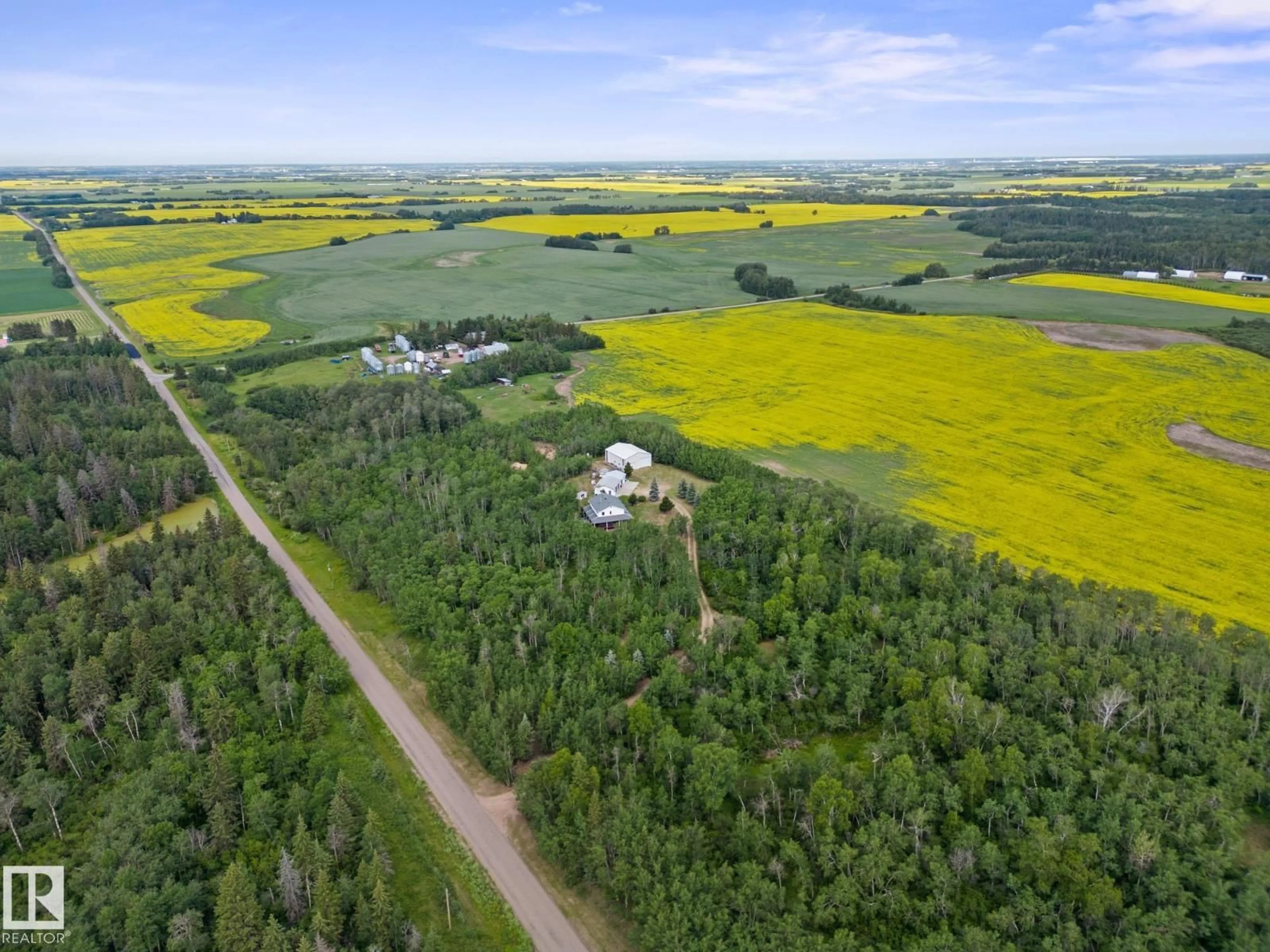 A pic from outside/outdoor area/front of a property/back of a property/a pic from drone, forest/trees view for 20456 TWP ROAD 544, Rural Strathcona County Alberta T8L3Z3