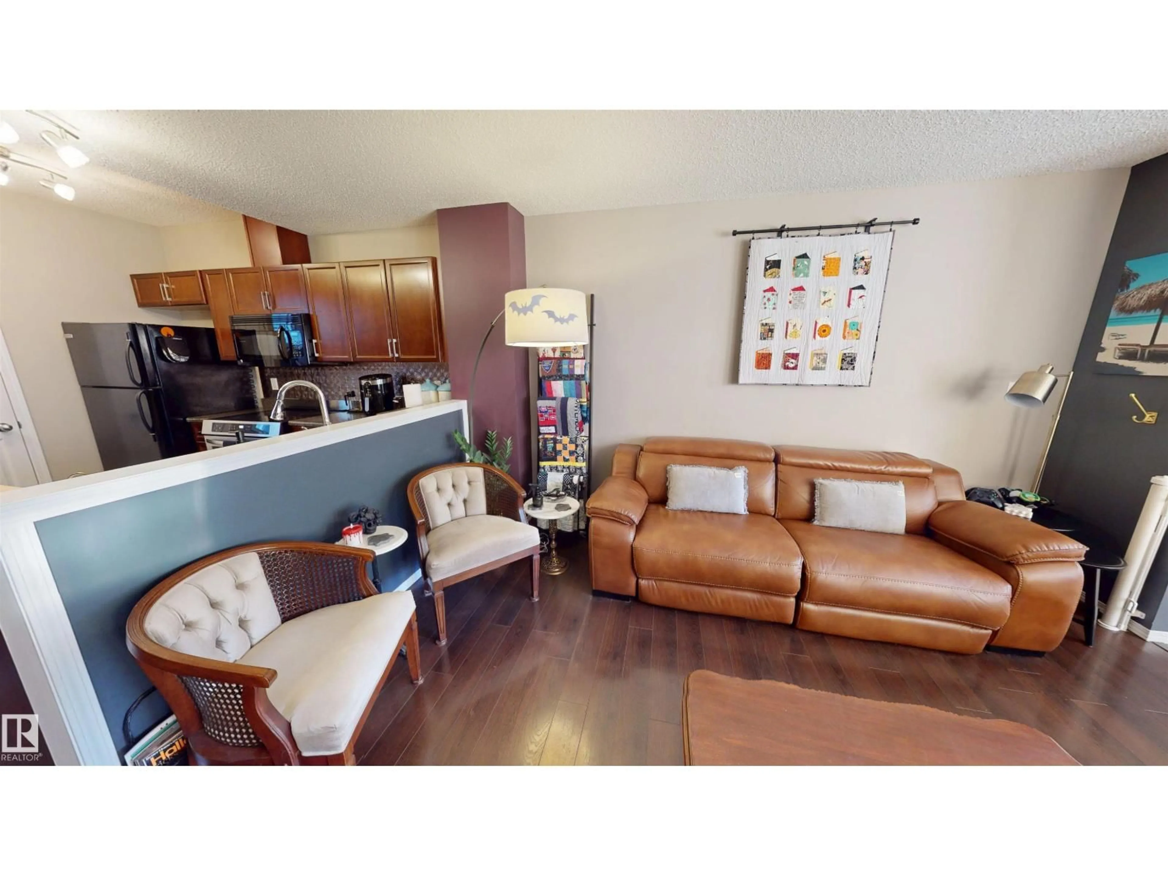 Living room with furniture, unknown for 43 - 5604 199 ST NW, Edmonton Alberta T6M2Z9