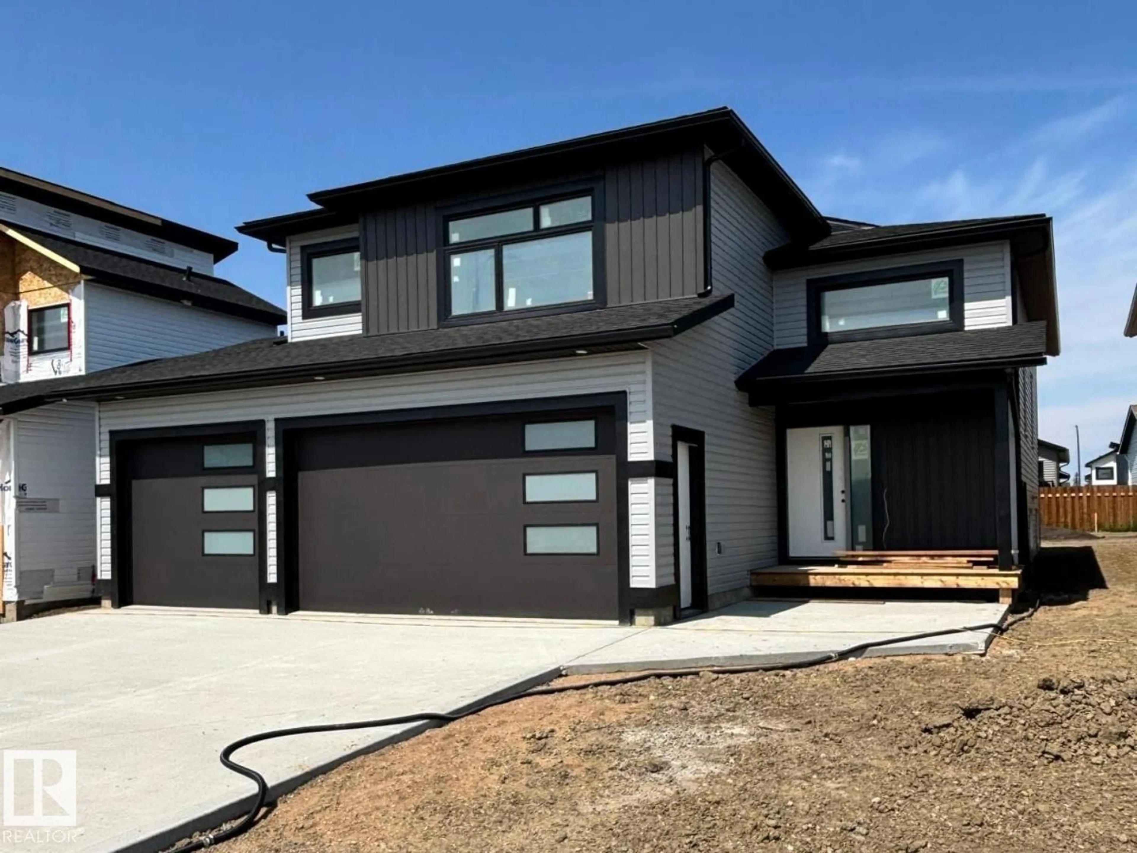 Home with vinyl exterior material, street for 329 FUNDY WY, Cold Lake Alberta T9M0M4