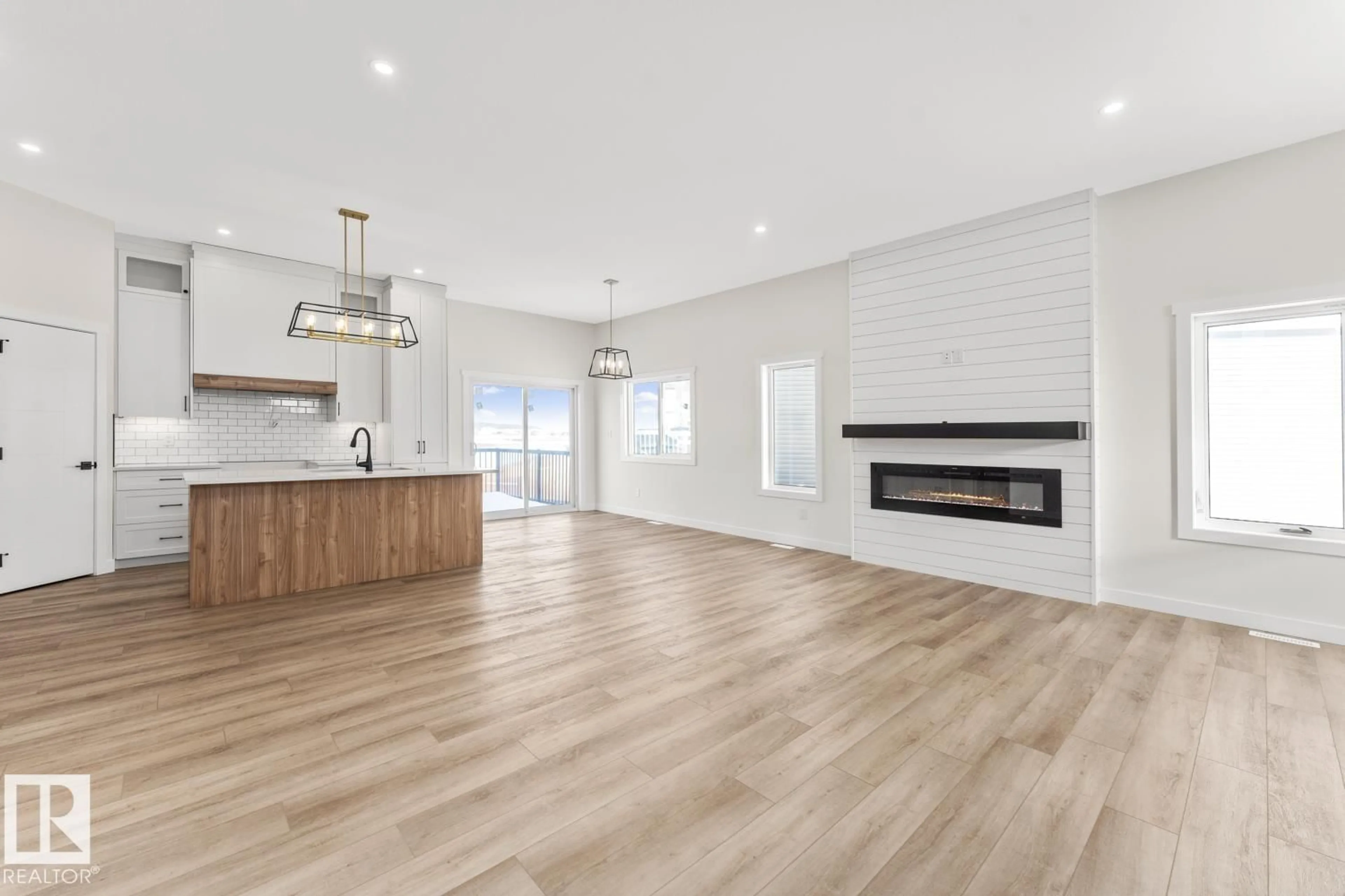 Open concept kitchen, wood/laminate floor for 329 FUNDY WY, Cold Lake Alberta T9M0M4