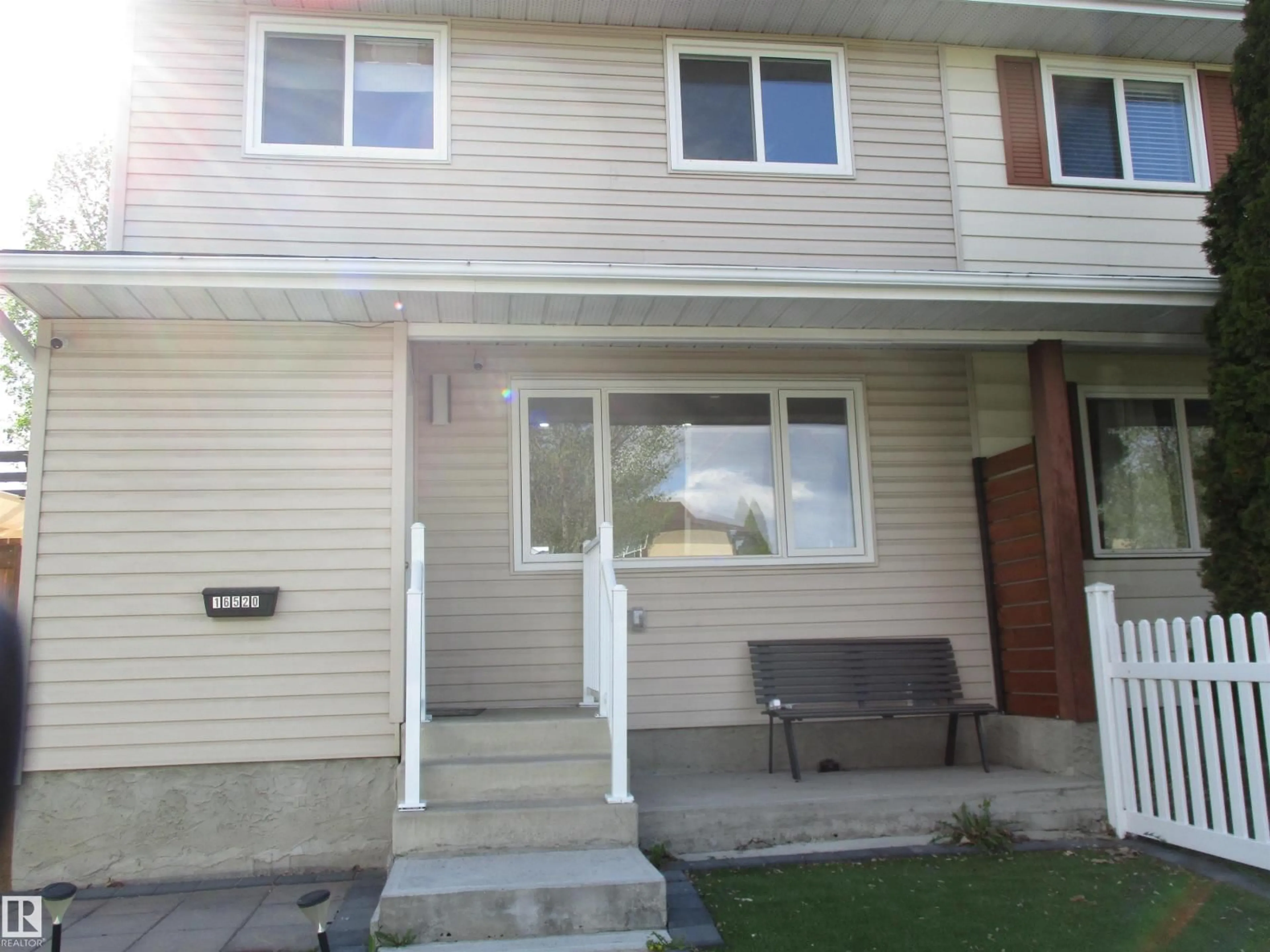 Home with vinyl exterior material, street for NW - 16520 115 ST, Edmonton Alberta T5X3V4