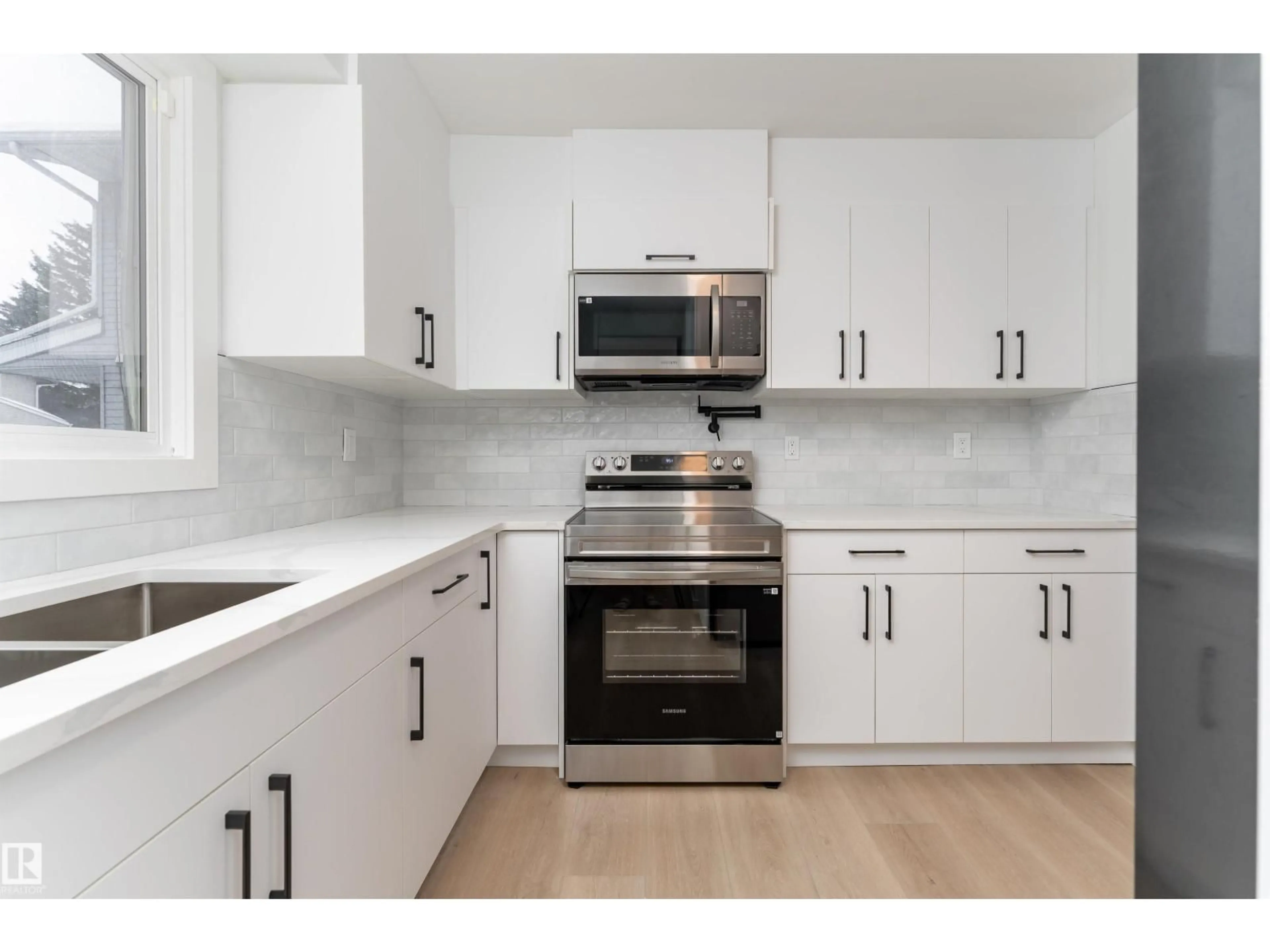 Standard kitchen, wood/laminate floor for #9 - 1415 62 ST, Edmonton Alberta T6L4K1