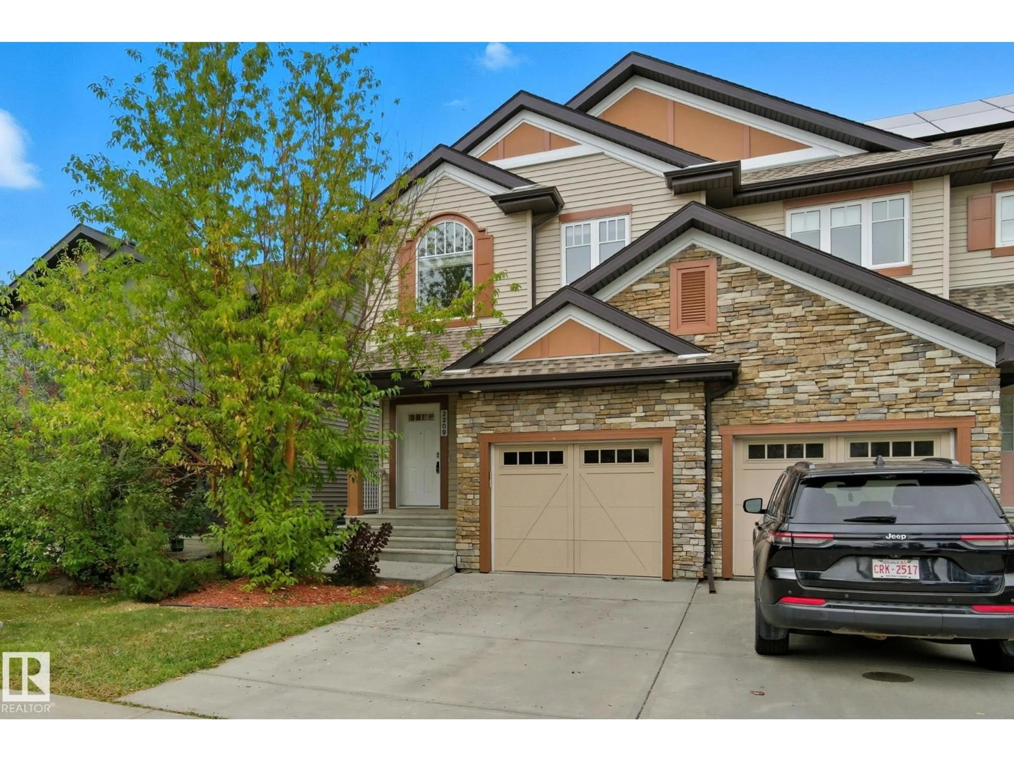 Home with brick exterior material, street for 2209 AUSTIN WY, Edmonton Alberta T6W0L2