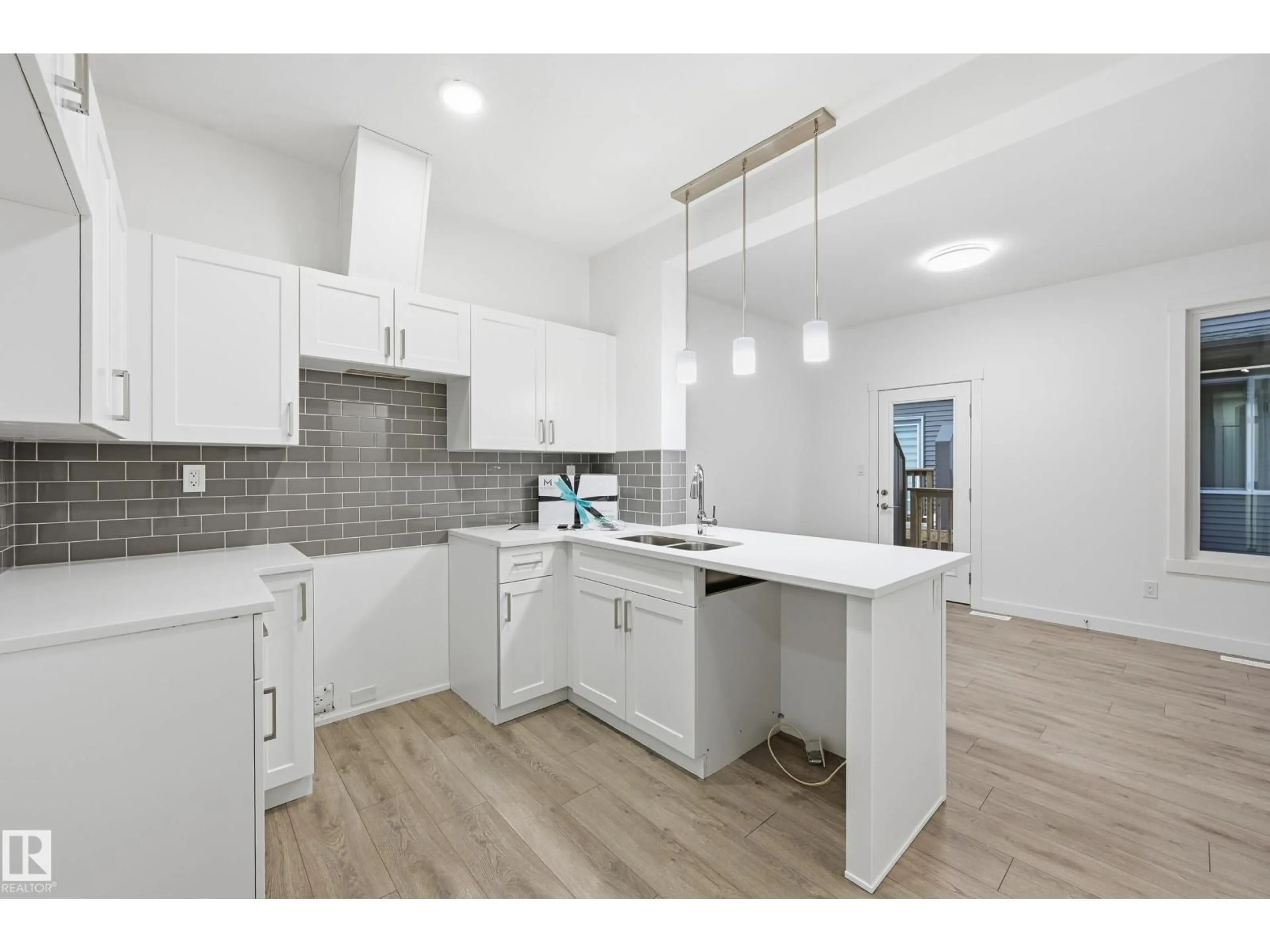 Open concept kitchen, unknown for 40 - 2710 66 ST, Edmonton Alberta T6X3H4