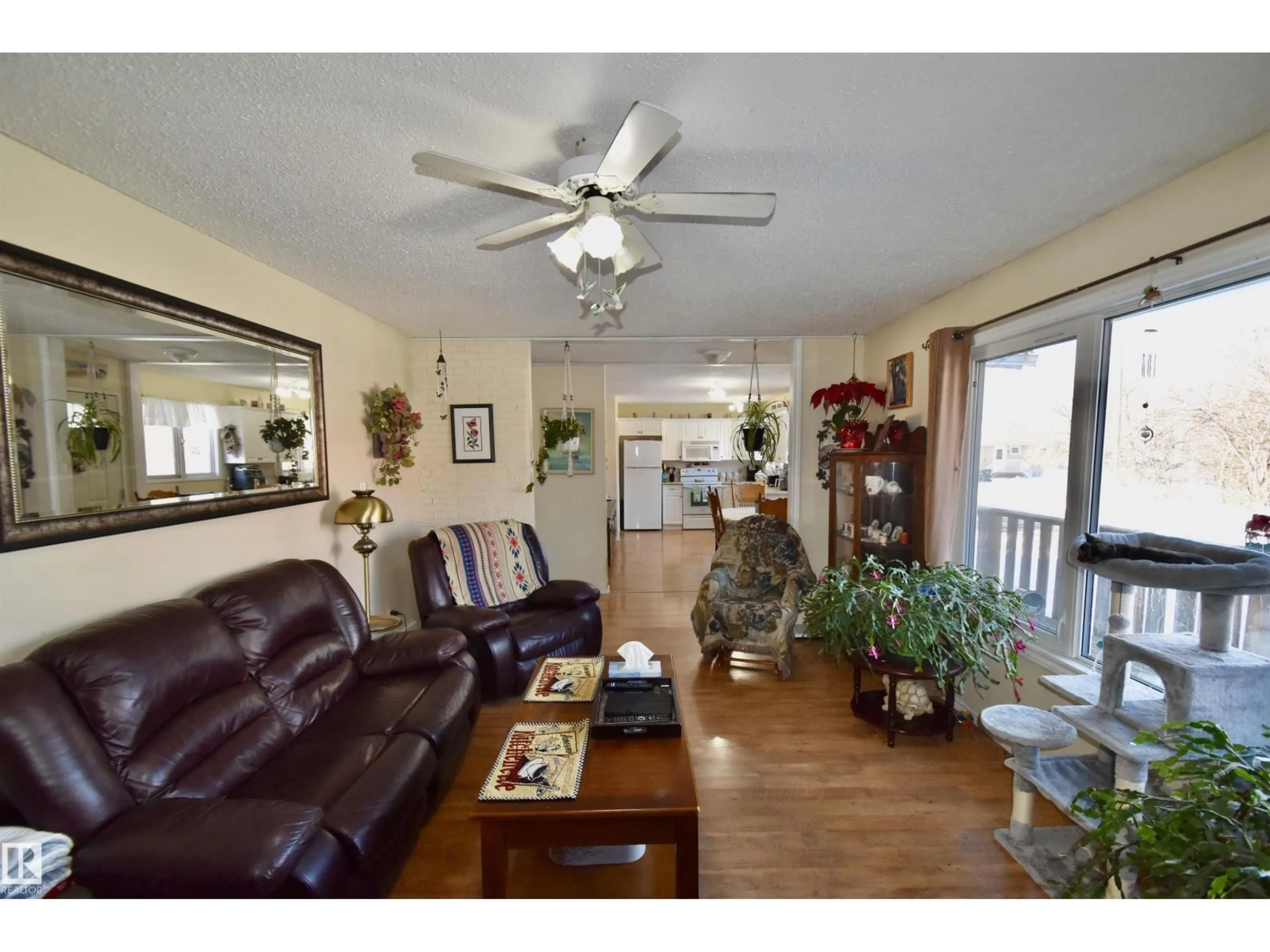 Living room with furniture, wood/laminate floor for 5117 54 AV, St. Paul Town Alberta T0A3A4