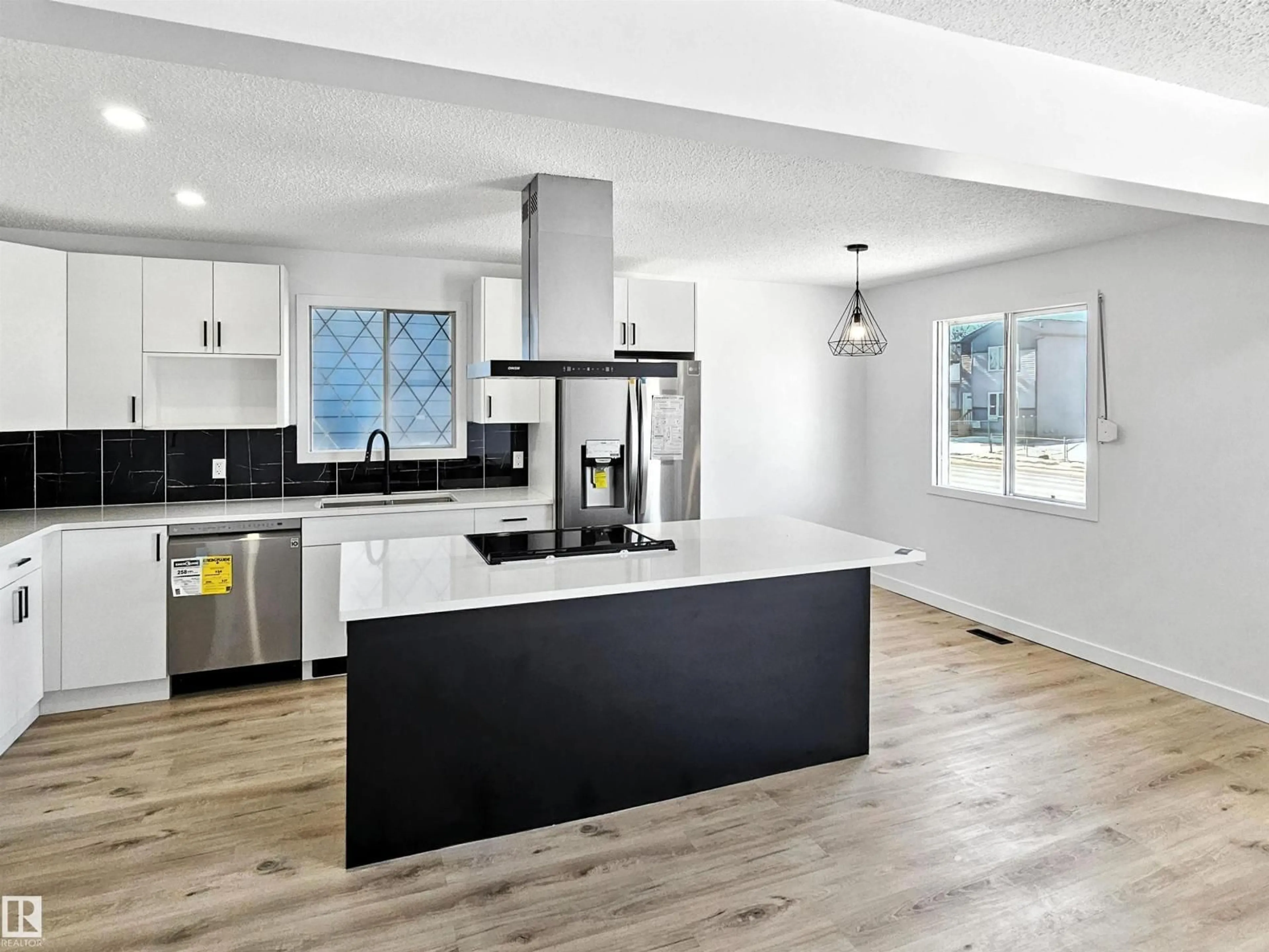 Open concept kitchen, unknown for NW - 11523 82 ST, Edmonton Alberta T5B2V7