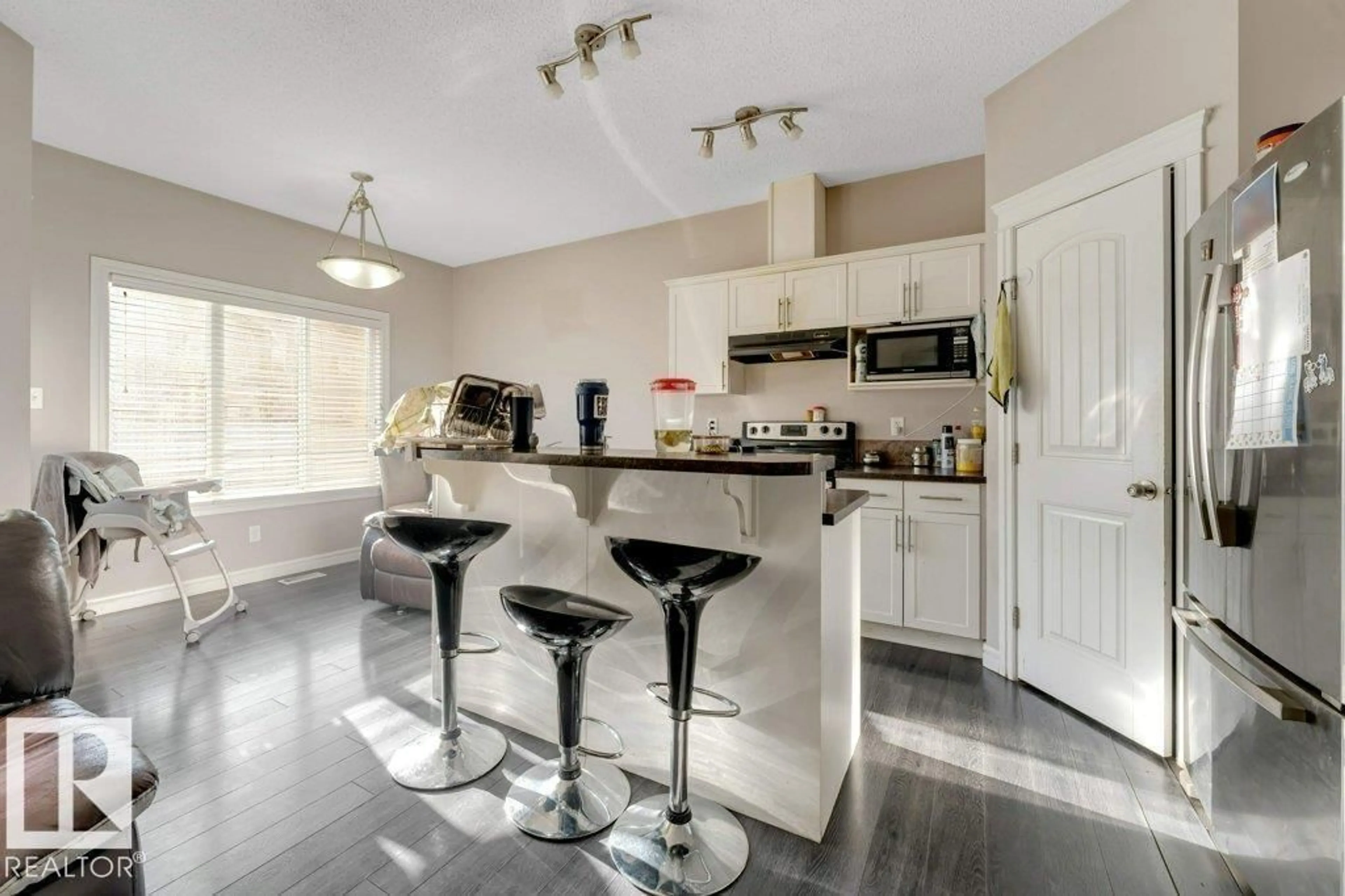 Open concept kitchen, ceramic/tile floor for 2929 16A AV, Edmonton Alberta T6T0P8