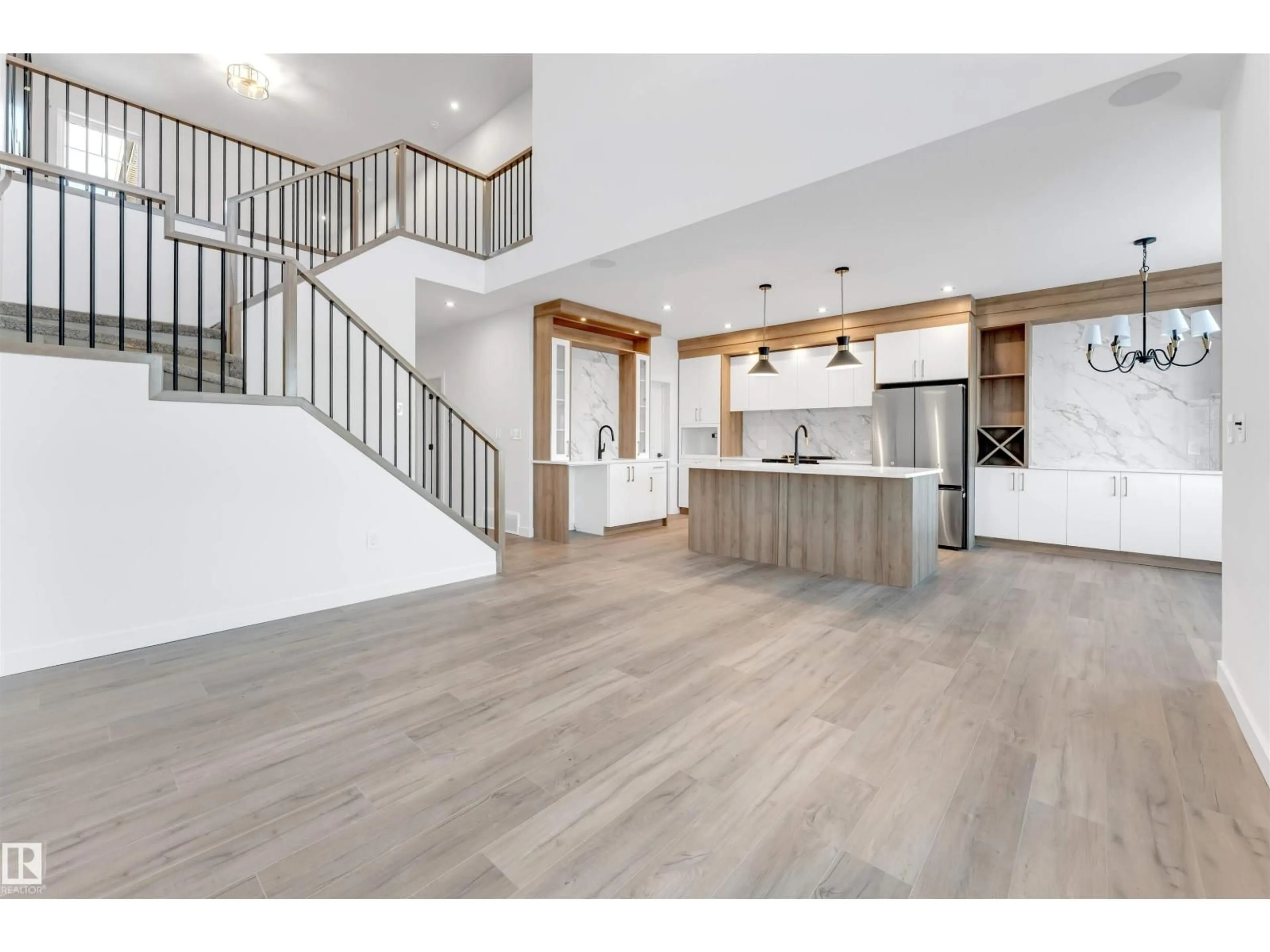 Open concept kitchen, wood/laminate floor for 8 MEADOWGROVE LD, Spruce Grove Alberta T7X0W2