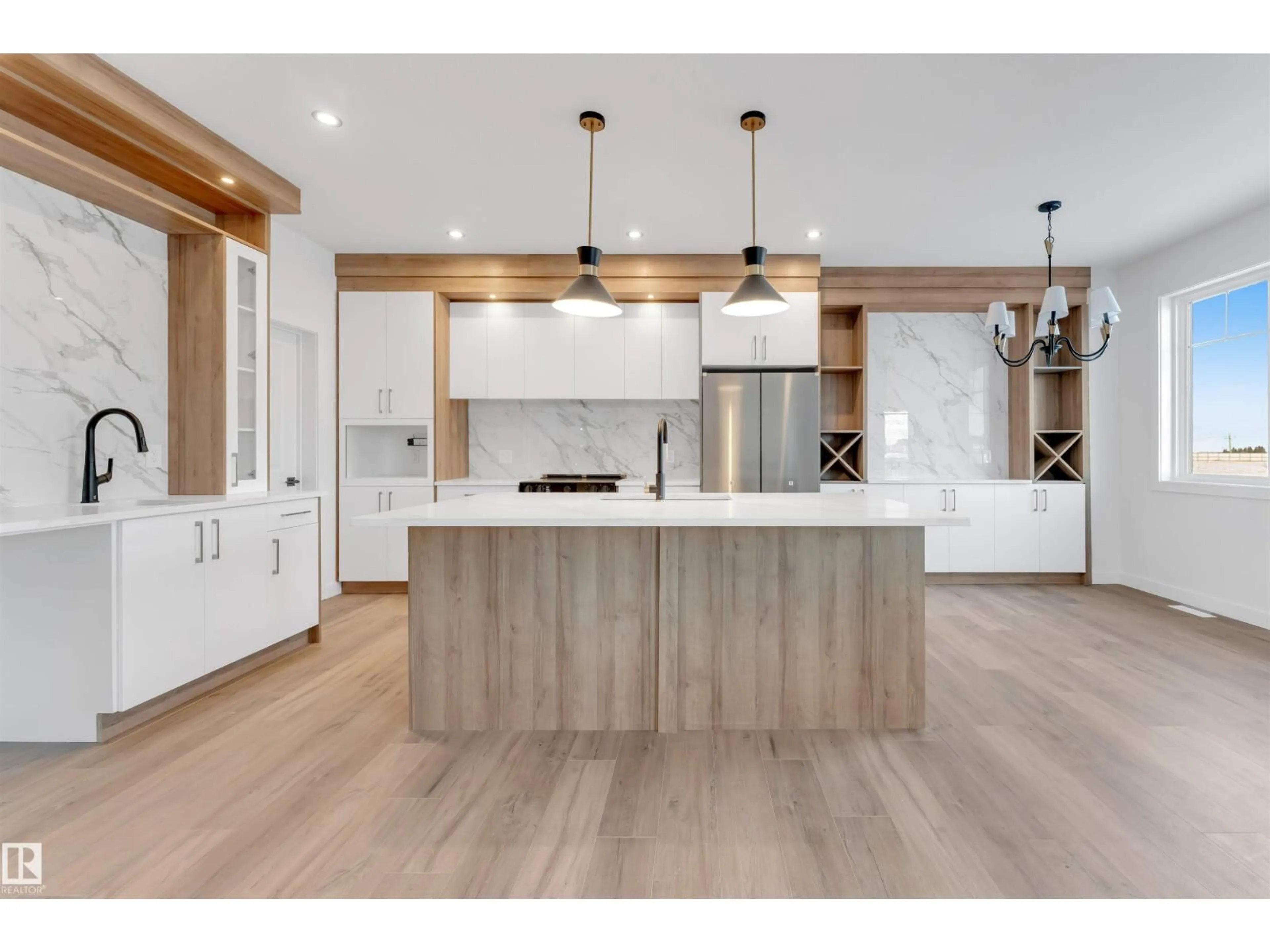 Open concept kitchen, wood/laminate floor for 8 MEADOWGROVE LD, Spruce Grove Alberta T7X0W2