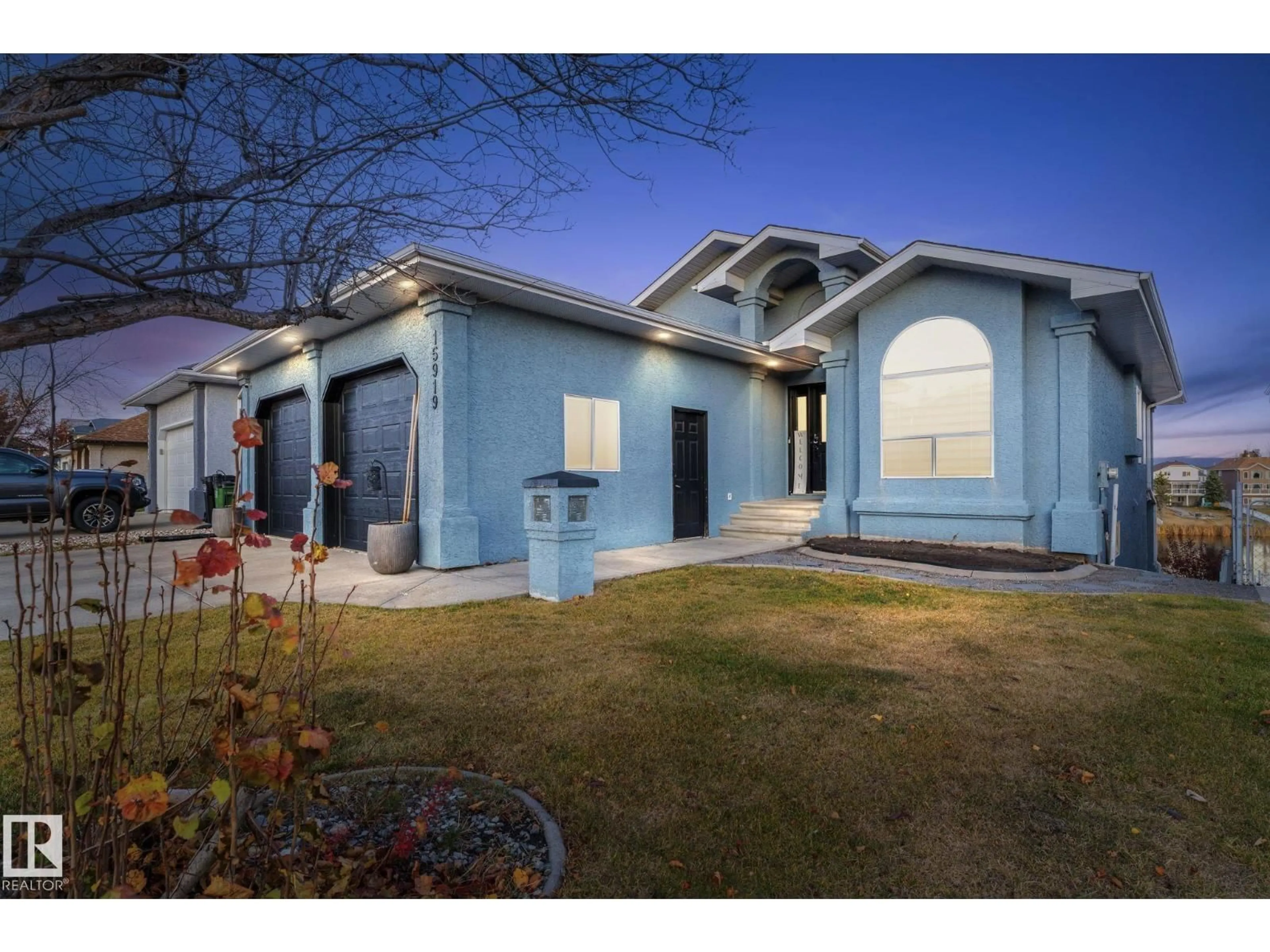 Home with vinyl exterior material, street for NW - 15919 58 ST, Edmonton Alberta T5Y2R5