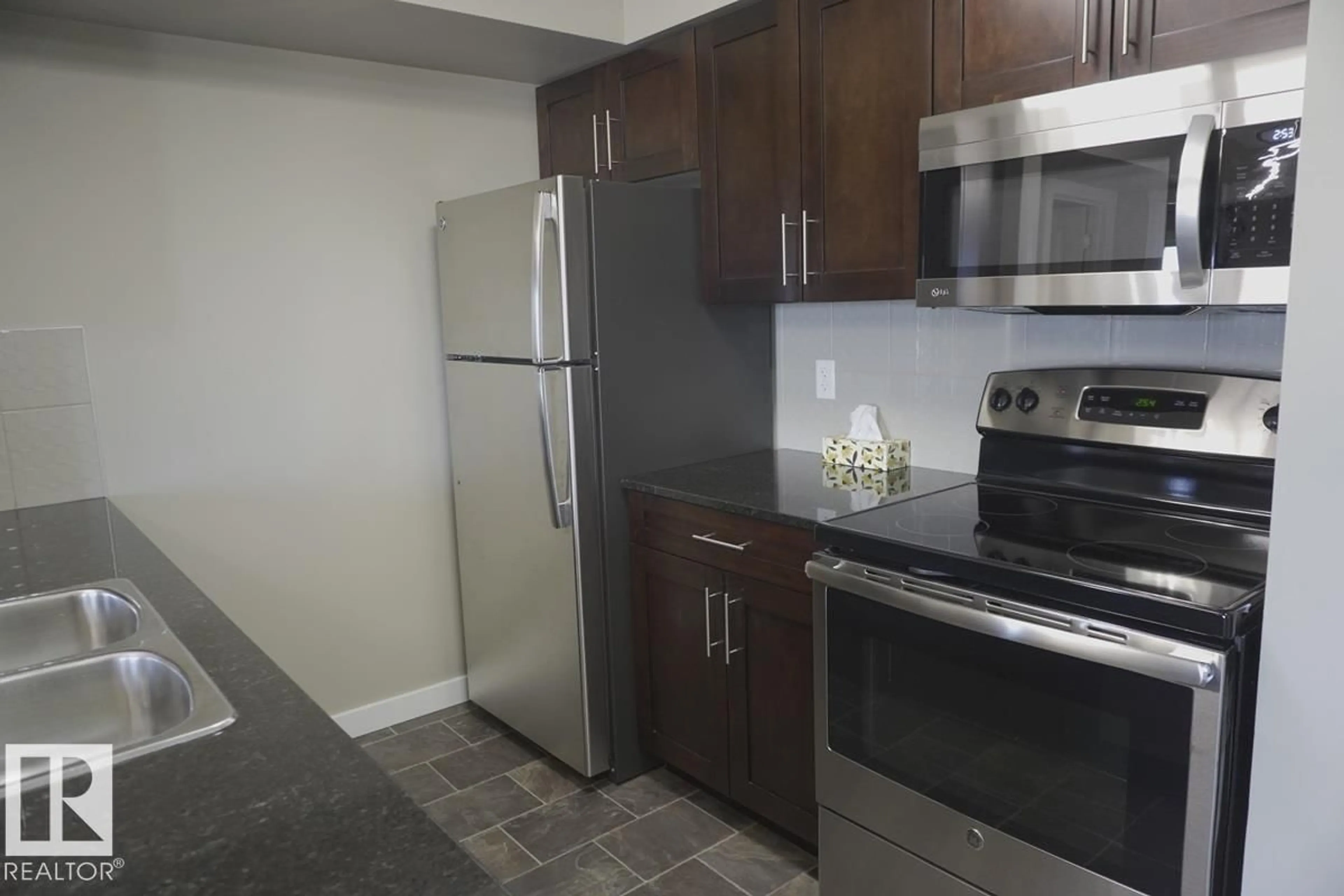 Standard kitchen, unknown for #409 - 5810 MULLEN PL, Edmonton Alberta T6R0W3