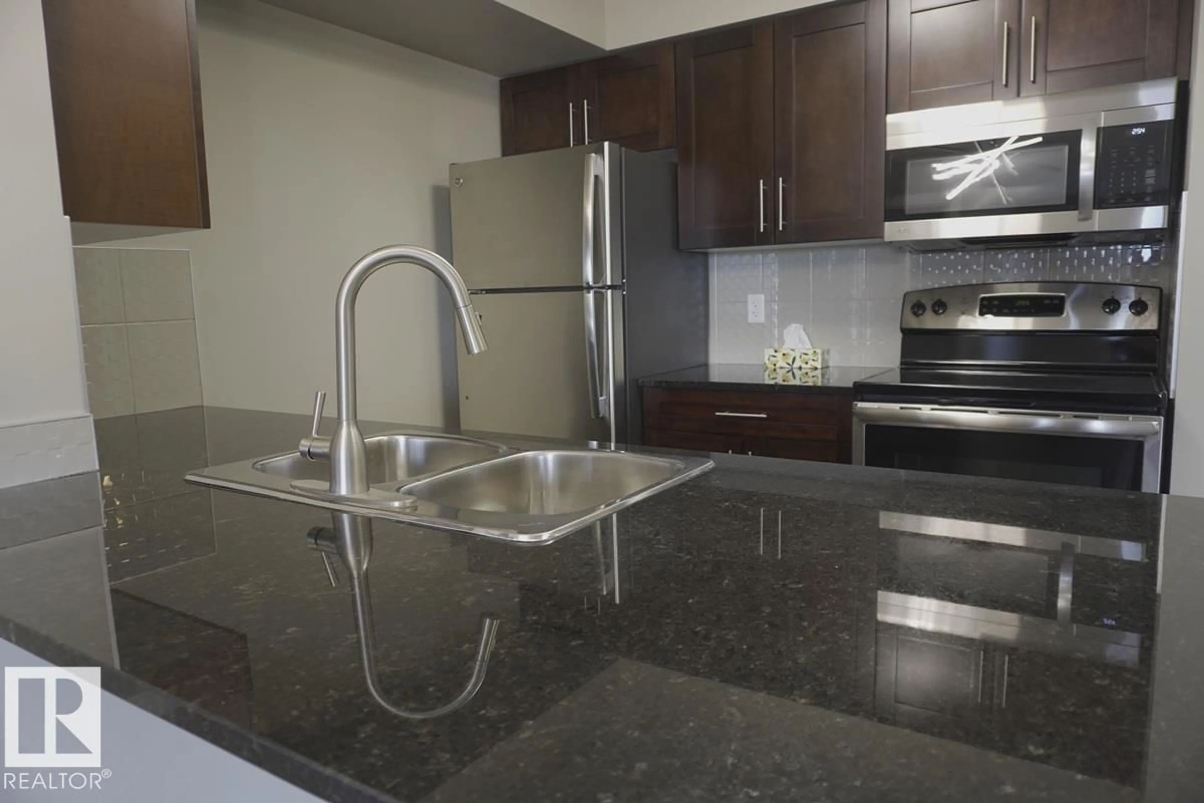 Standard kitchen, unknown for #409 - 5810 MULLEN PL, Edmonton Alberta T6R0W3