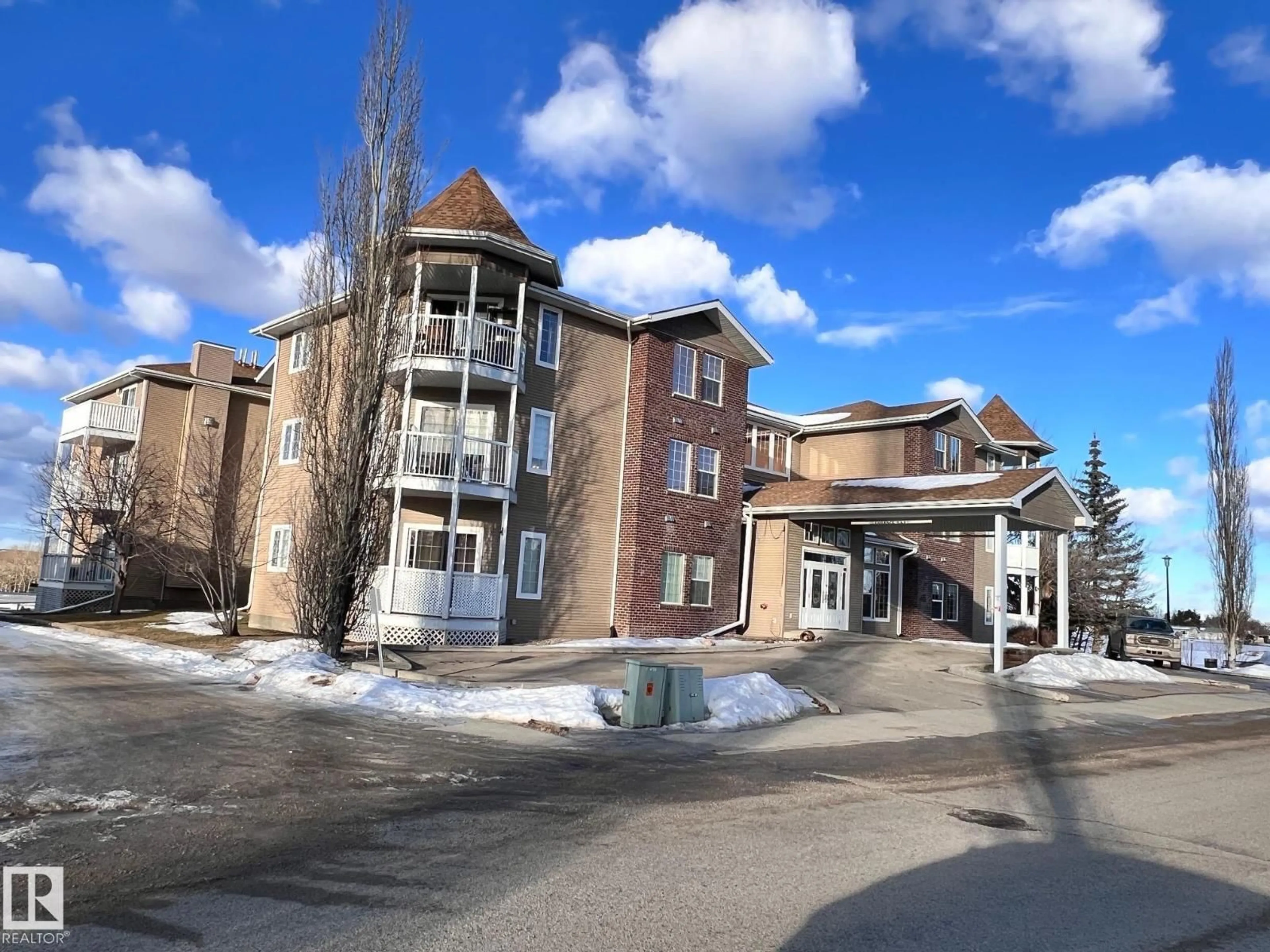 A pic from outside/outdoor area/front of a property/back of a property/a pic from drone, unknown for #306 - 4128 47 ST, Drayton Valley Alberta T7A0A9