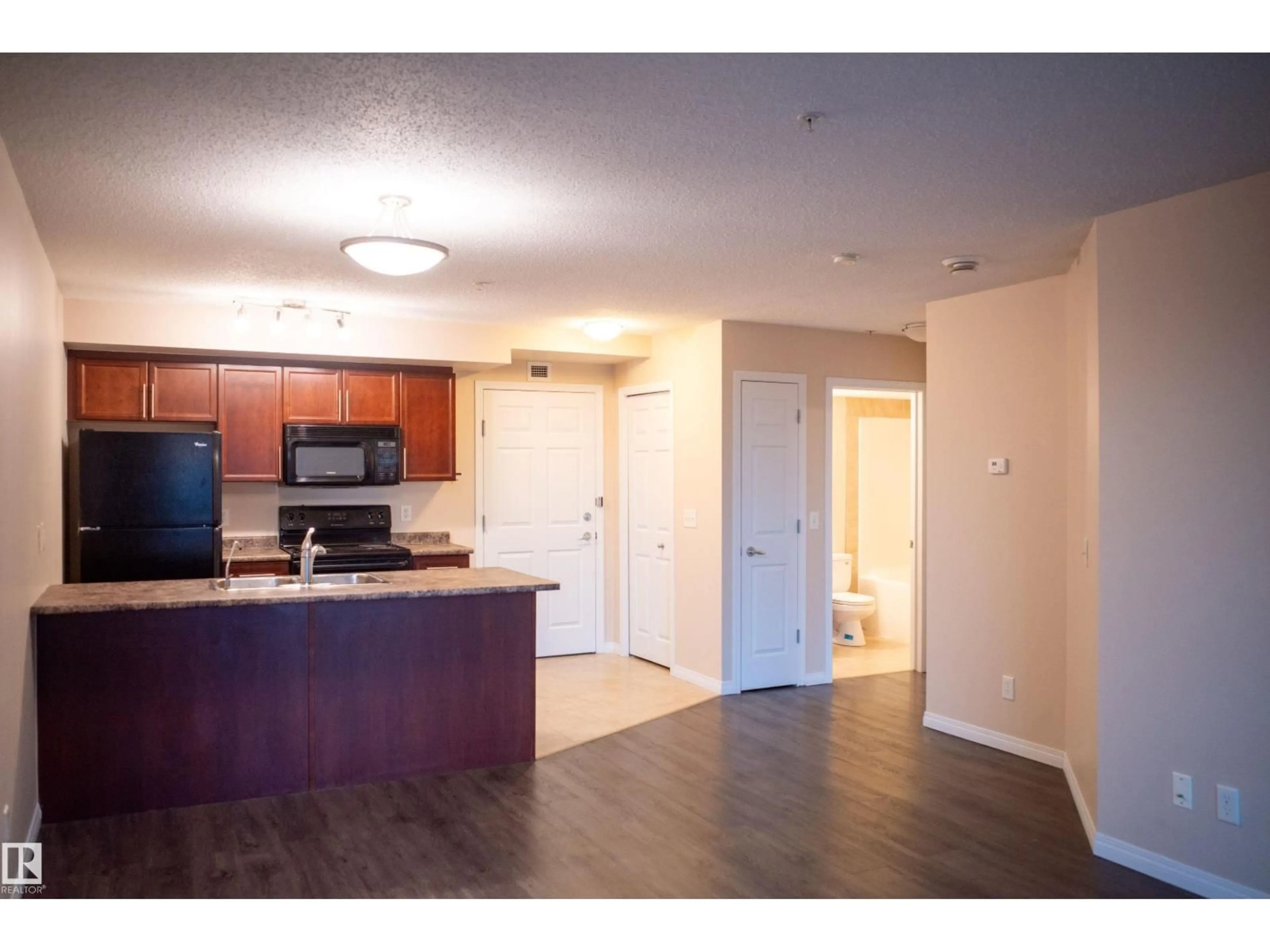 Standard kitchen, wood/laminate floor for 207 - 6925 199 ST, Edmonton Alberta T5T3X8