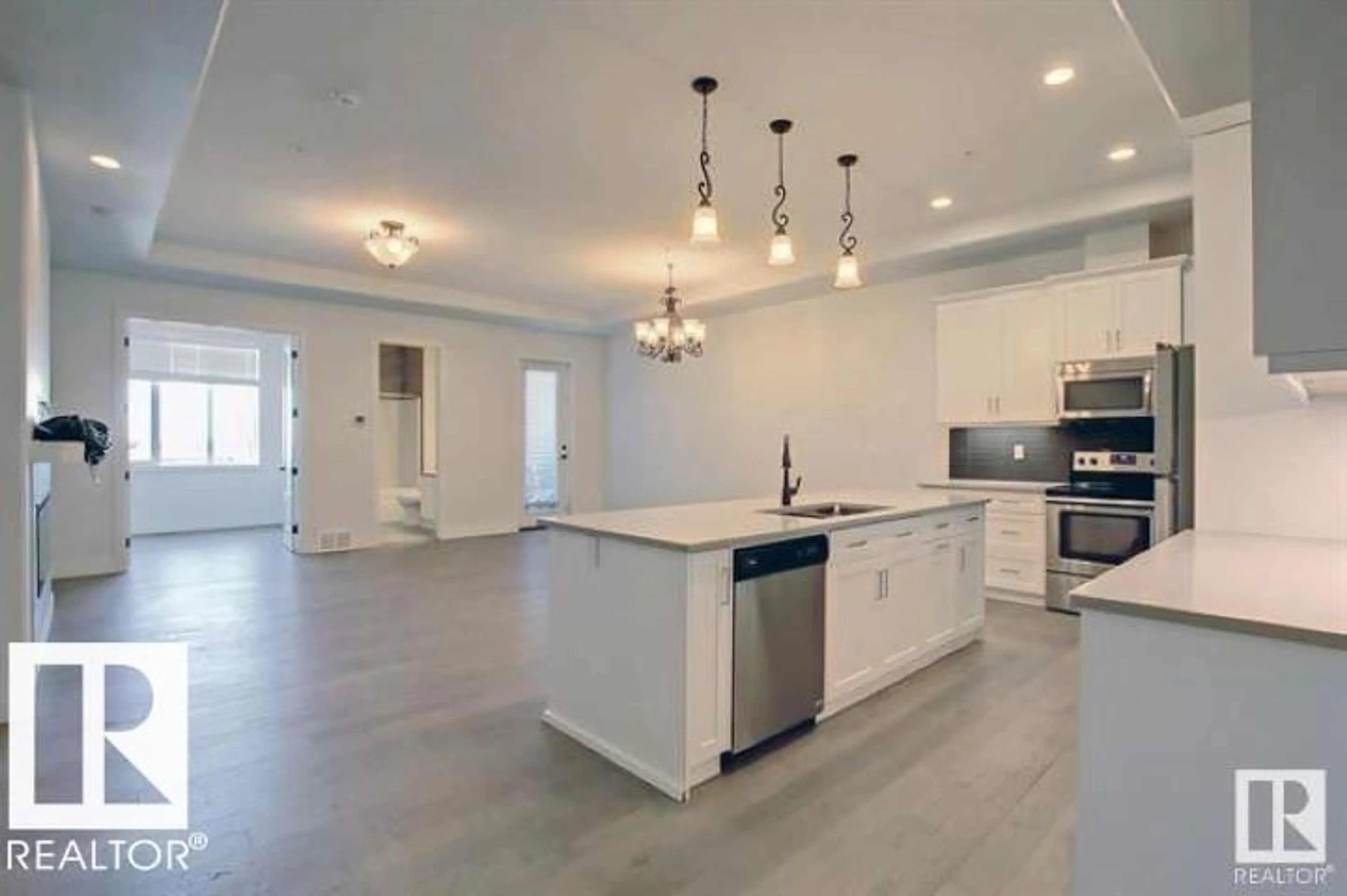 Open concept kitchen, ceramic/tile floor for NE - 2934 58 AV, Rural Leduc County Alberta T4X0X9