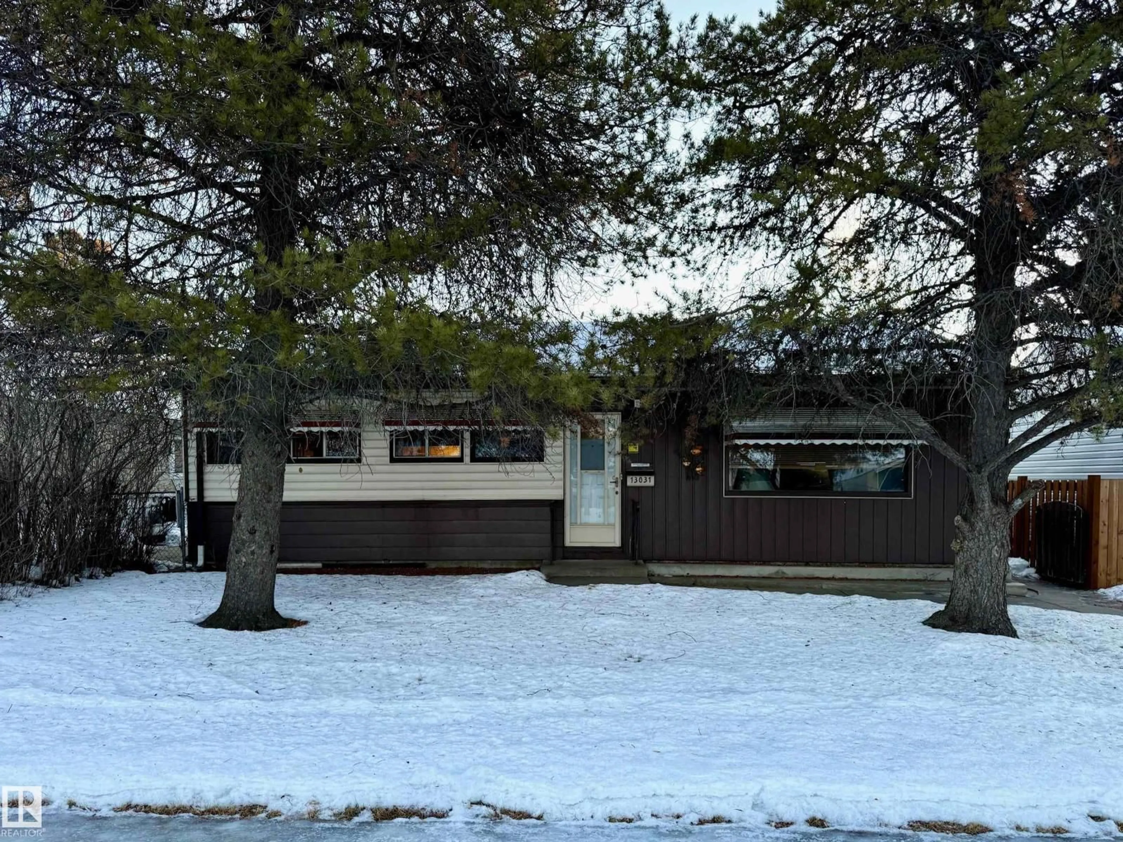 Home with vinyl exterior material, street for NW - 13031 115 ST, Edmonton Alberta T5E5G4