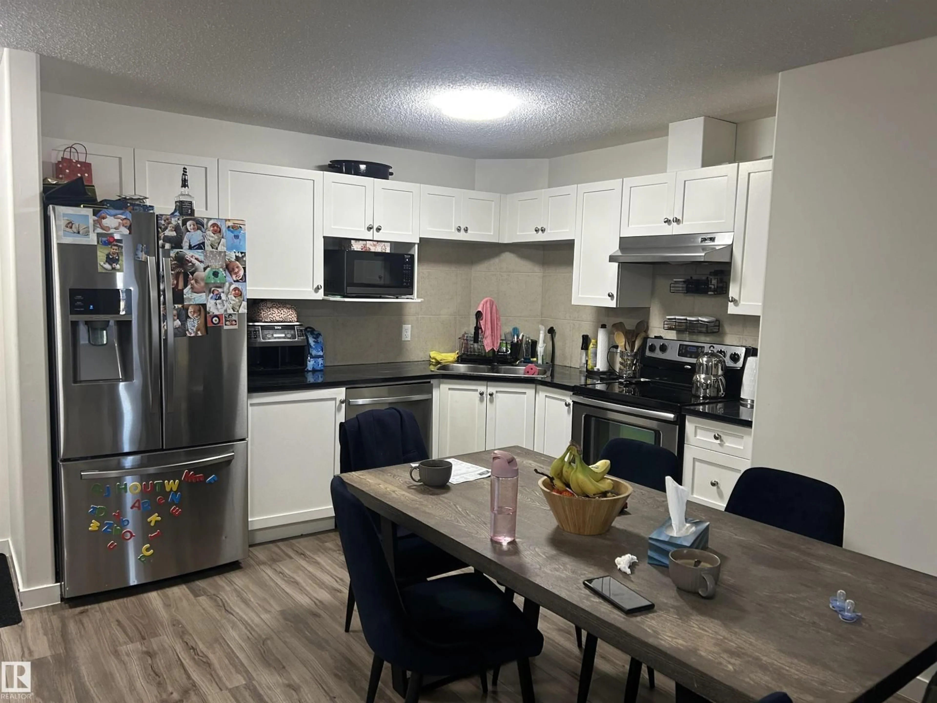 Open concept kitchen, unknown for #141 - 1520 HAMMOND GATE, Edmonton Alberta T6M0J4