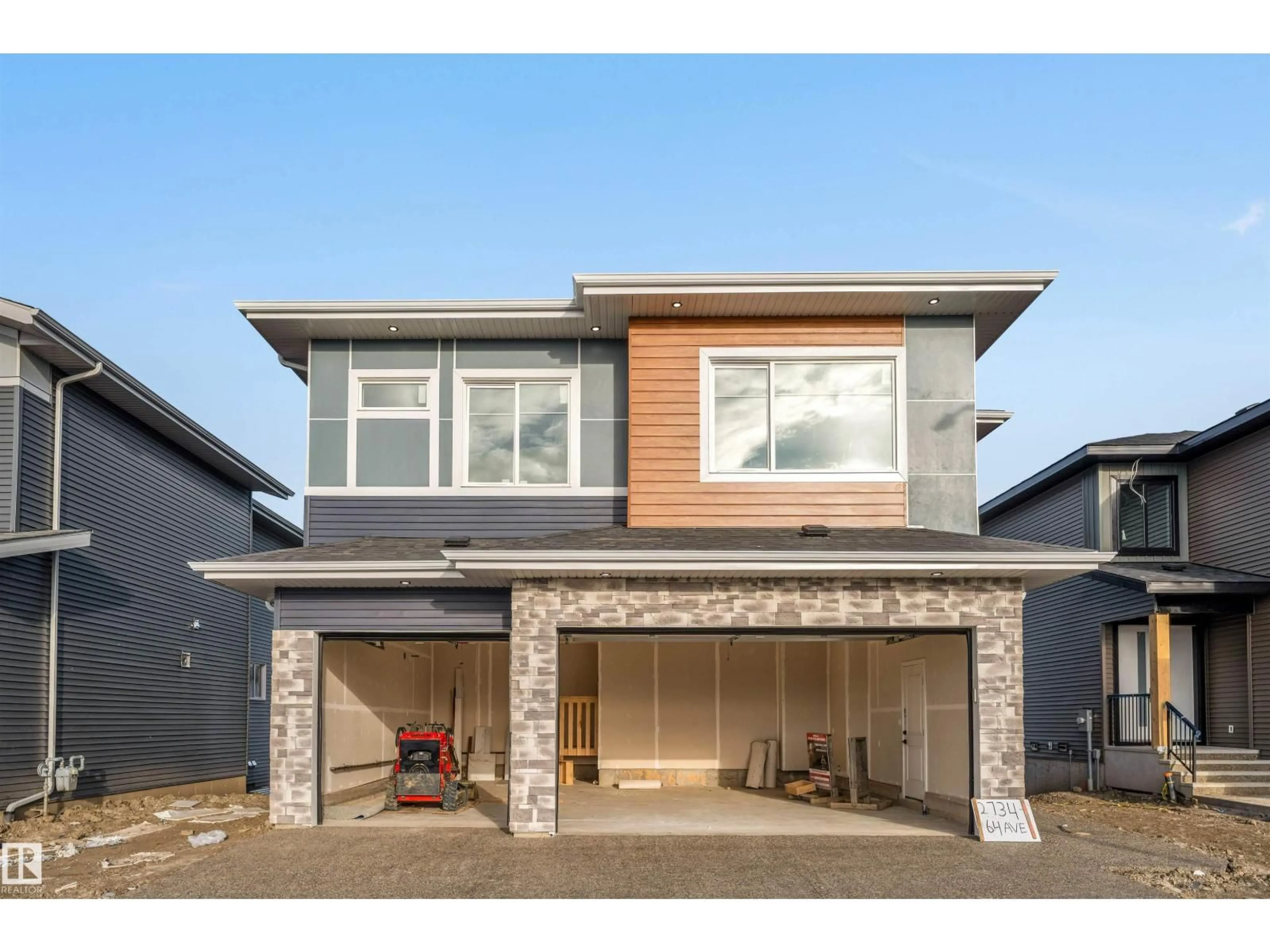 Home with brick exterior material, street for NE - 2734 64 AV, Rural Leduc County Alberta T4X0H6