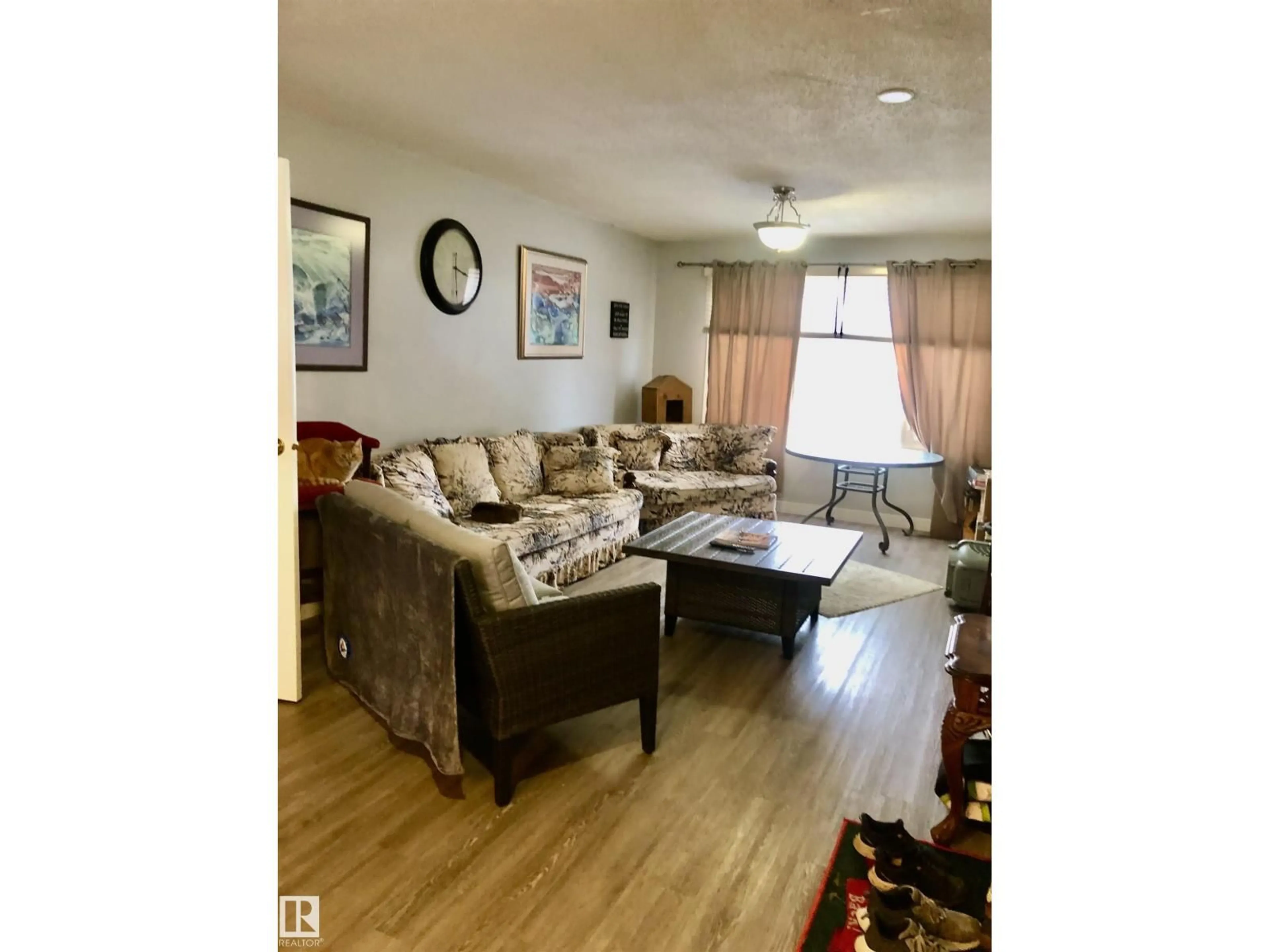 Living room with furniture, unknown for 5234 47 AV, Vegreville Alberta T9C1N2