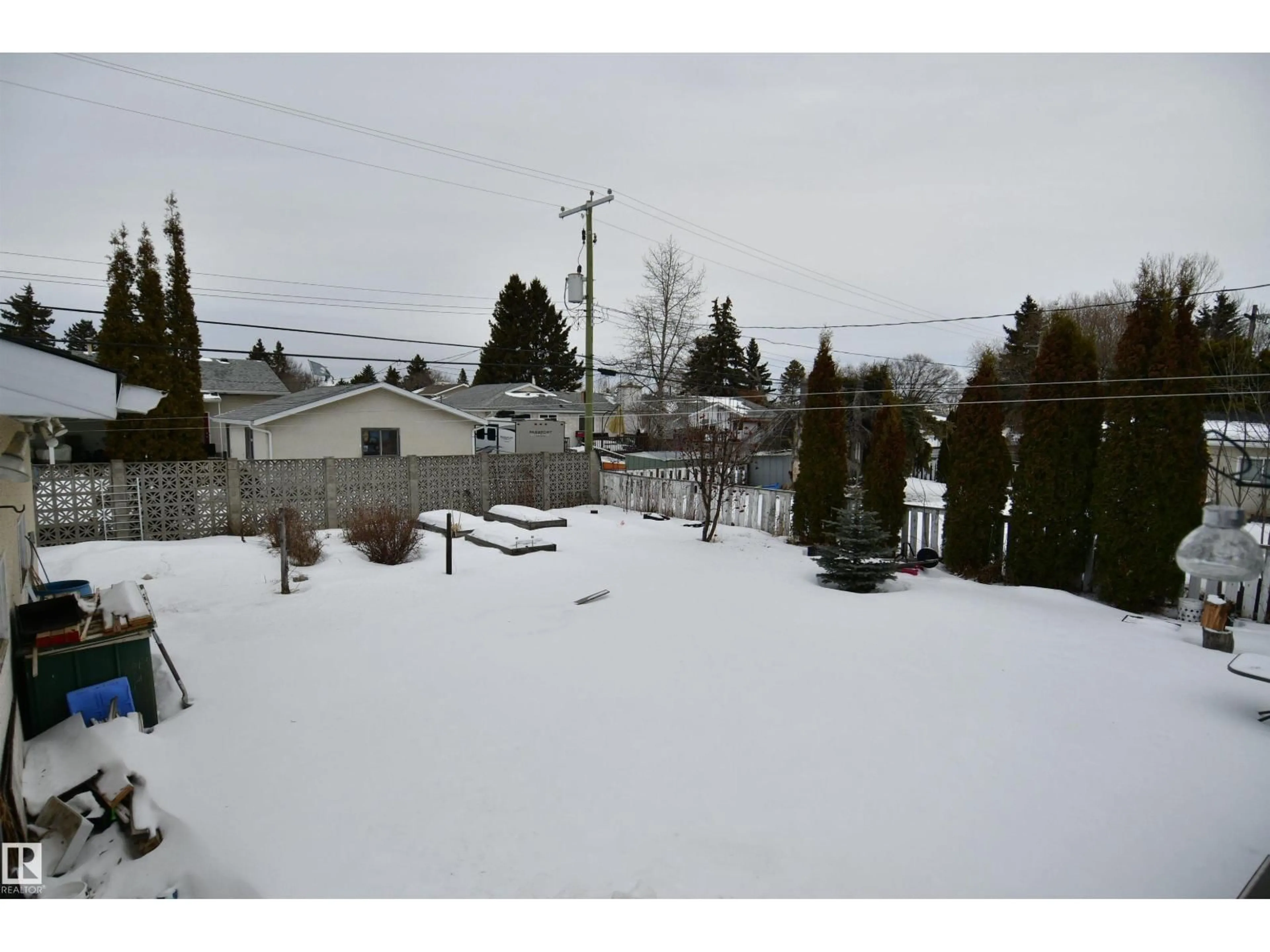 A pic from outside/outdoor area/front of a property/back of a property/a pic from drone, mountain view for 5012 54 AV, Leduc Alberta T9E5L5