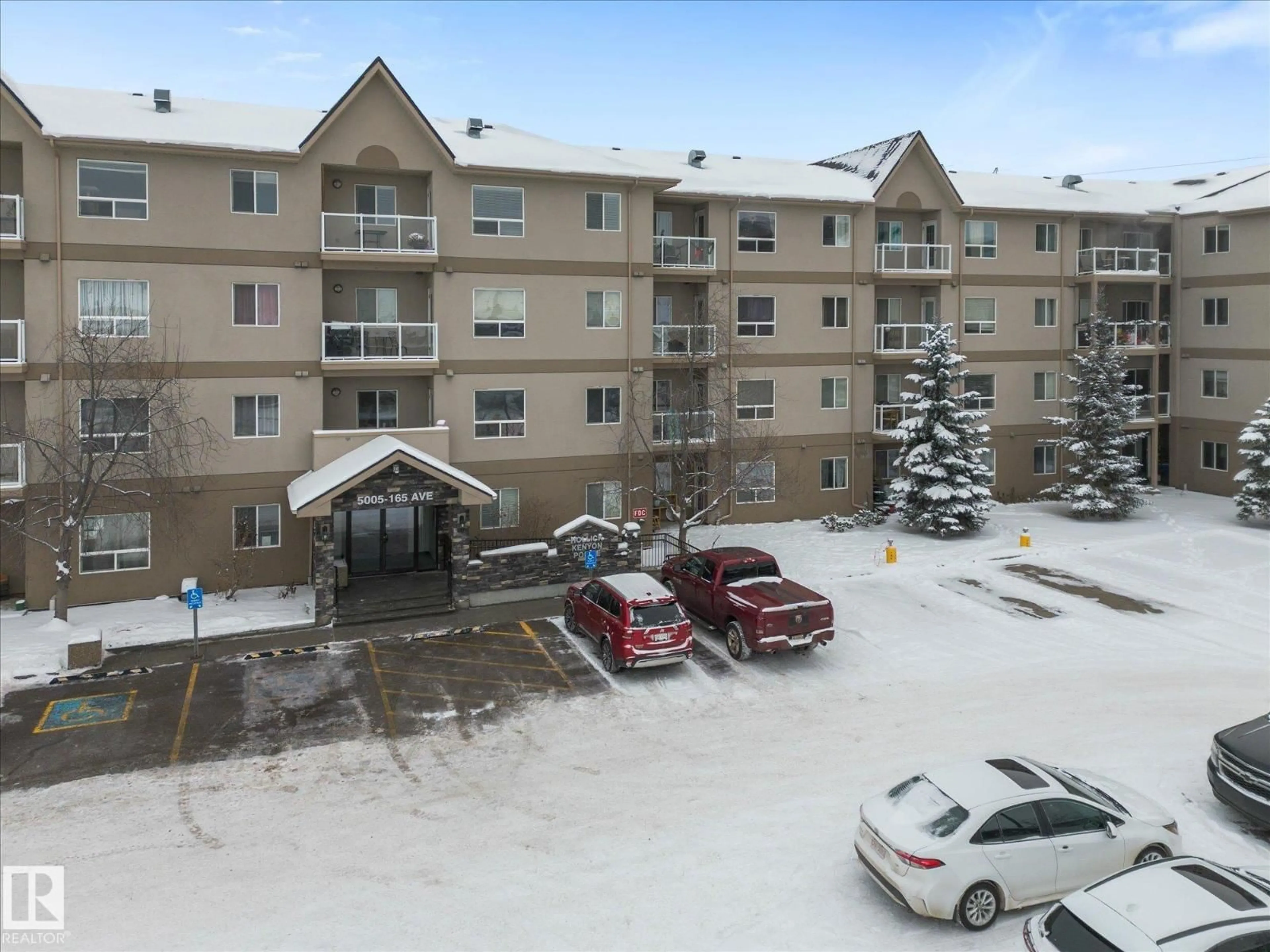 A pic from outside/outdoor area/front of a property/back of a property/a pic from drone, mountain view for #117 - 5005 165 AV, Edmonton Alberta T5Y0L8