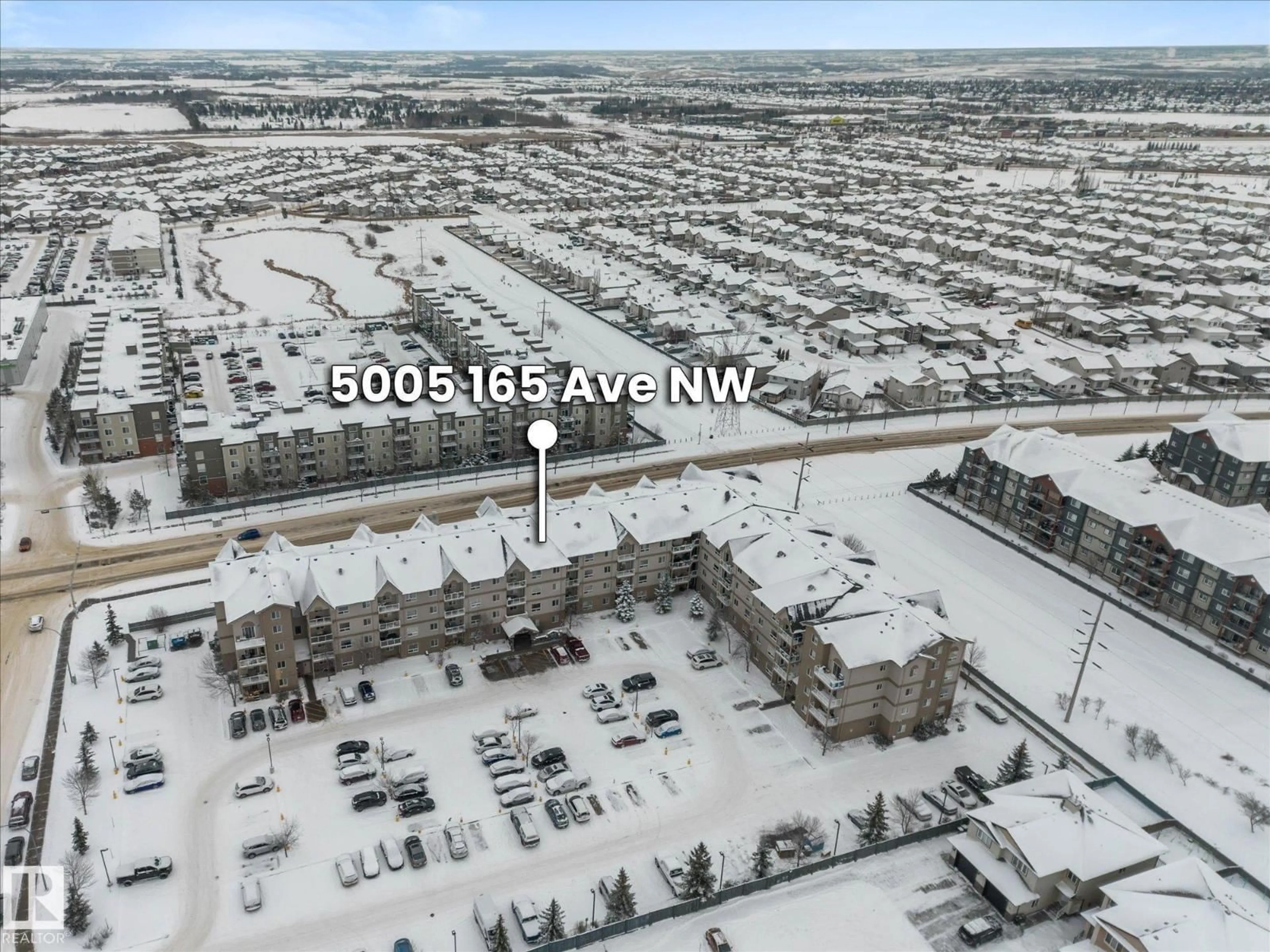 A pic from outside/outdoor area/front of a property/back of a property/a pic from drone, mountain view for #117 - 5005 165 AV, Edmonton Alberta T5Y0L8