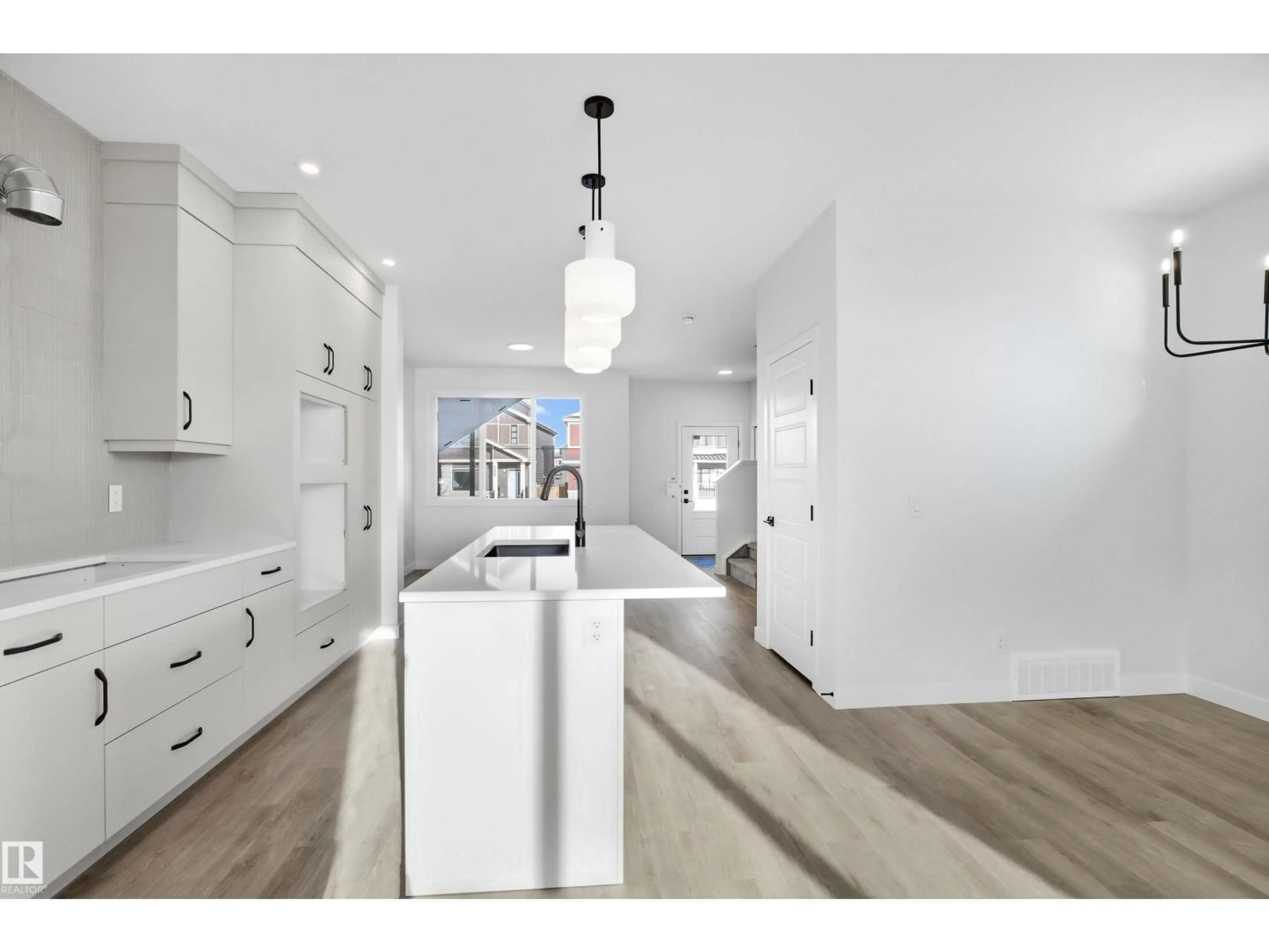 Open concept kitchen, unknown for 679 ORCHARDS BV, Edmonton Alberta T6X3C1