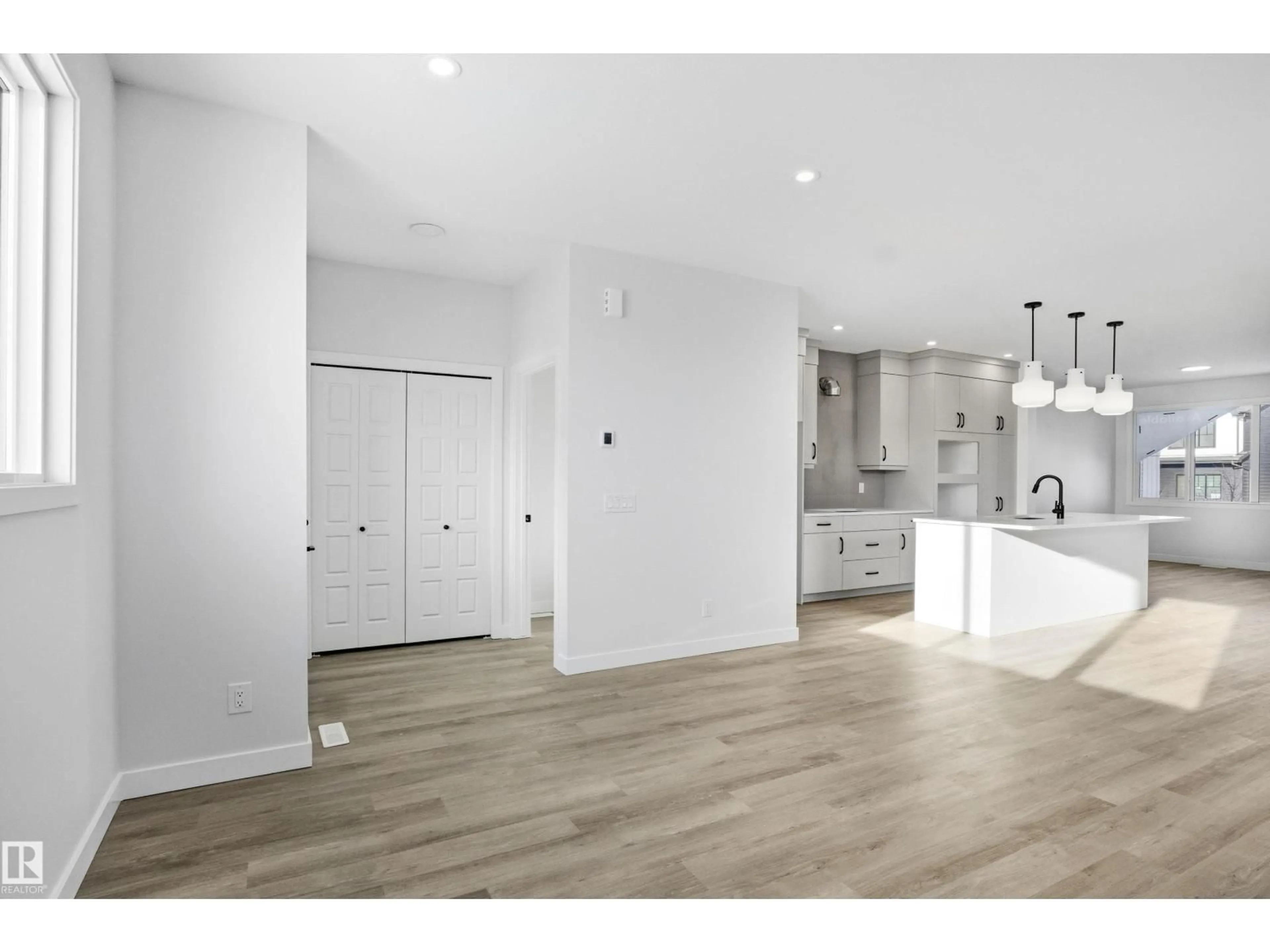 Open concept kitchen, unknown for 679 ORCHARDS BV, Edmonton Alberta T6X3C1