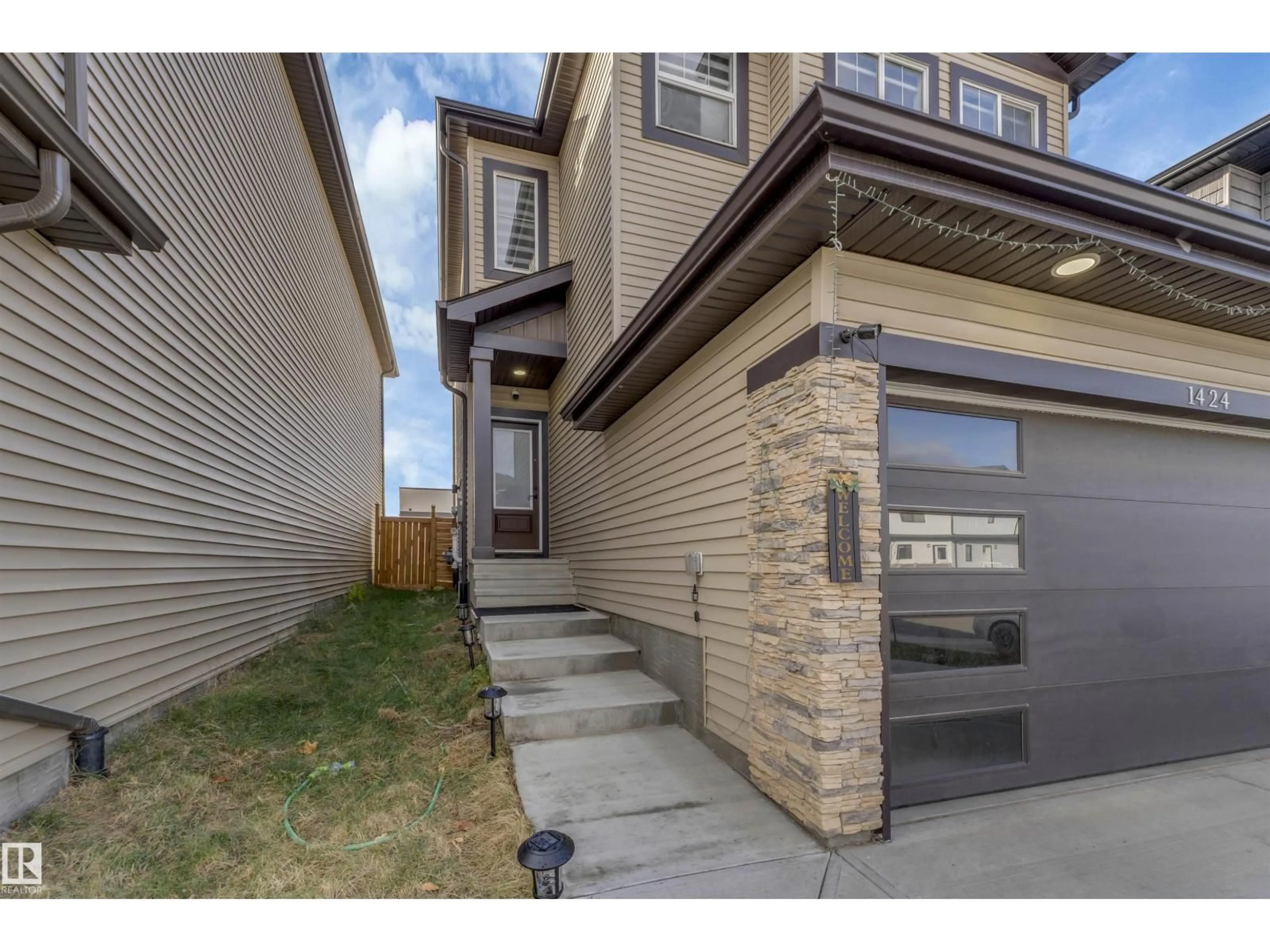 Home with brick exterior material, street for 1424 15 ST, Edmonton Alberta T6T2S2