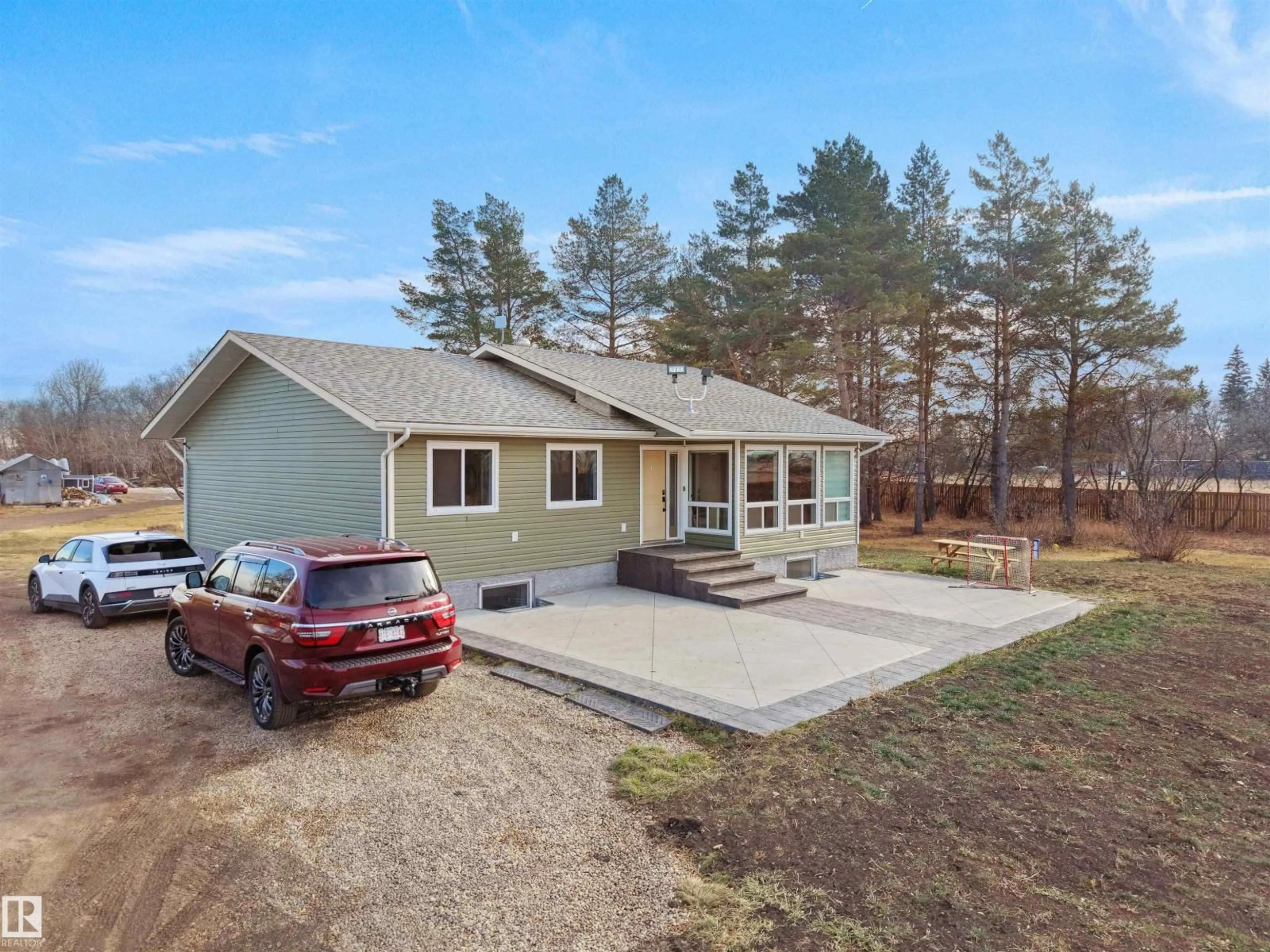 A pic from outside/outdoor area/front of a property/back of a property/a pic from drone, street for 55005 RGE 241 RD, Rural Sturgeon County Alberta T8T1W3