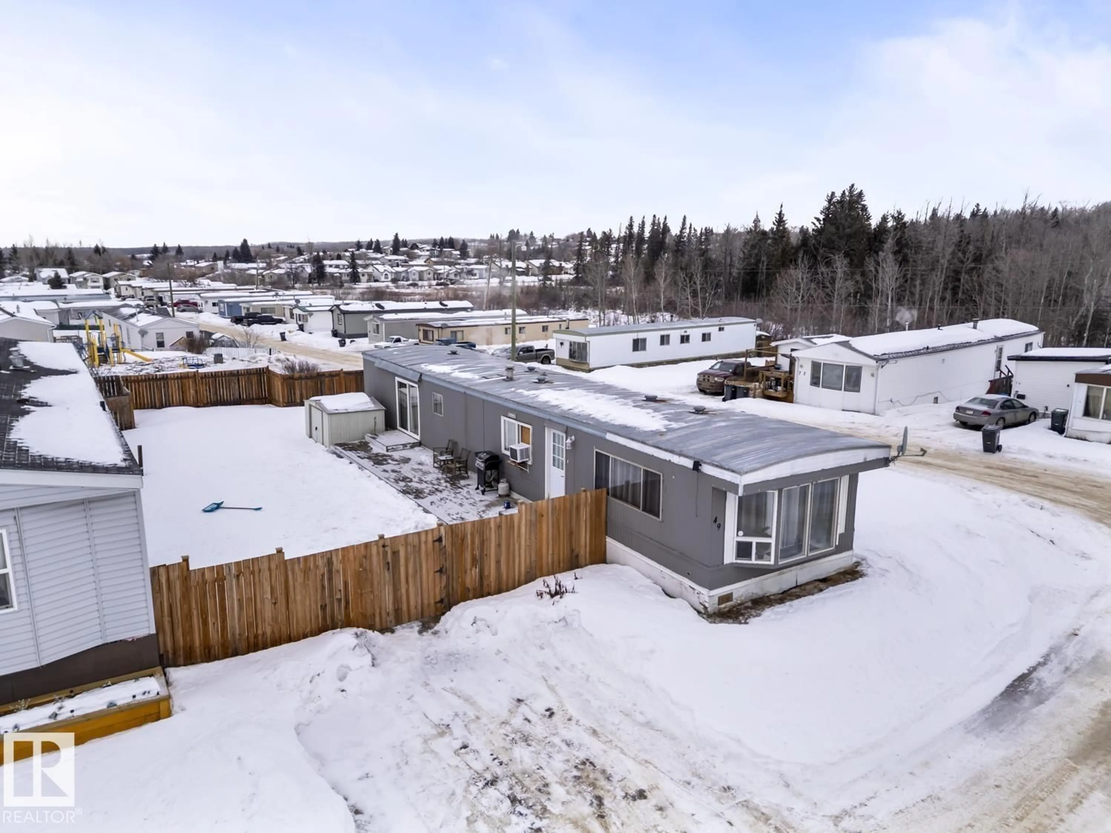 A pic from outside/outdoor area/front of a property/back of a property/a pic from drone, mountain view for 49 4405 50 AV, Cold Lake Alberta T9M1Z5