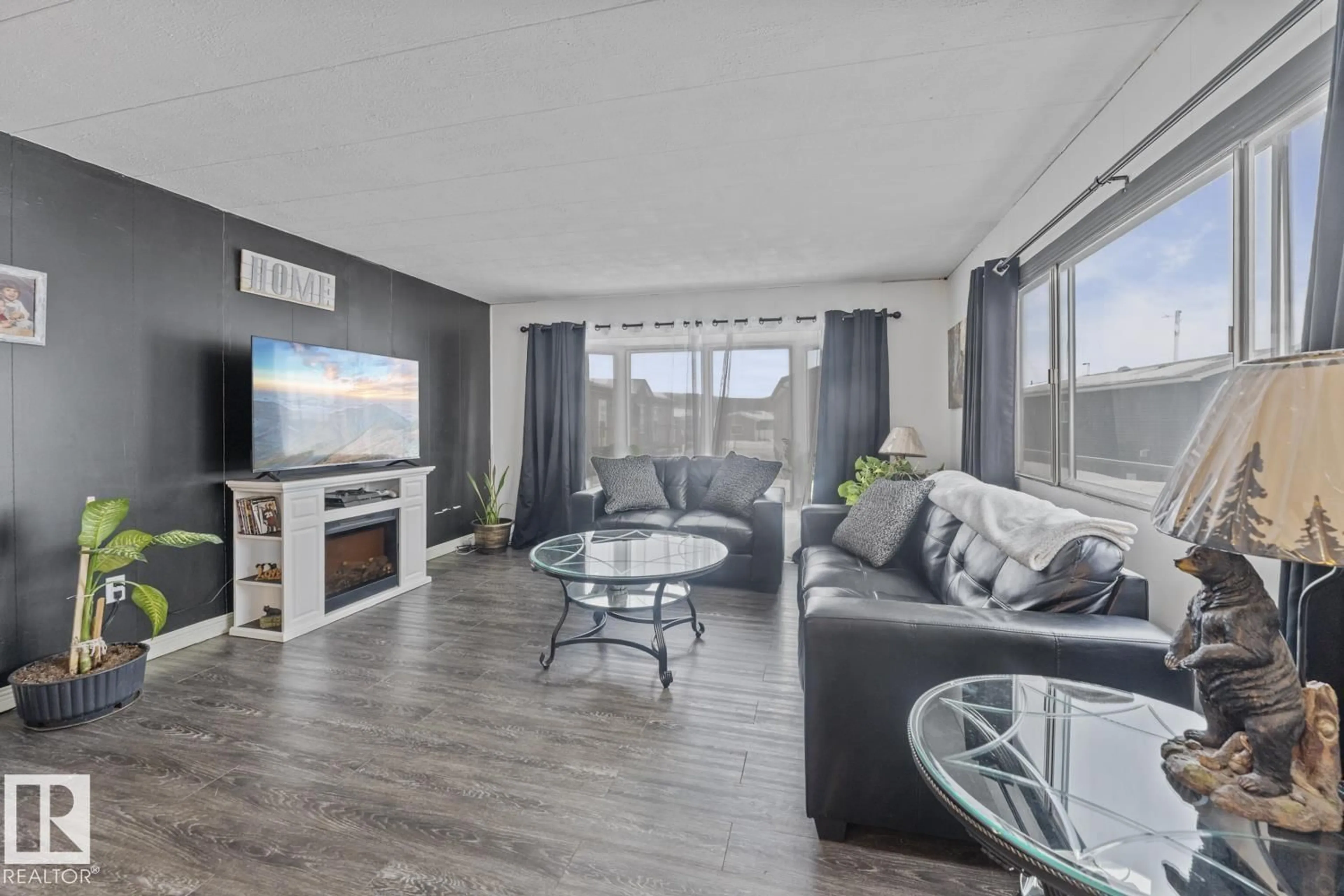 Living room with furniture, wood/laminate floor for 49 4405 50 AV, Cold Lake Alberta T9M1Z5