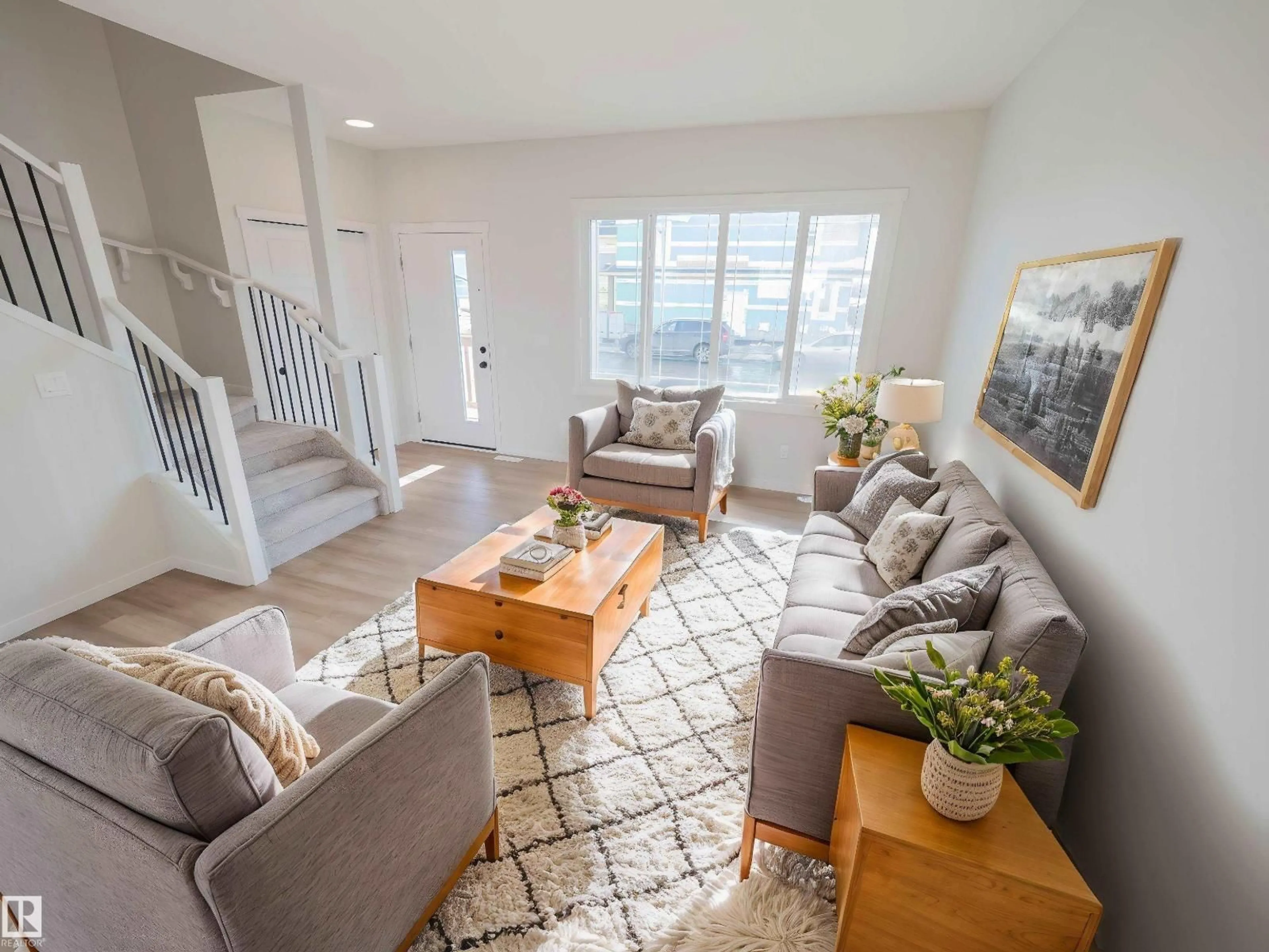 Living room with furniture, unknown for 1332 14 AV, Edmonton Alberta T6T2W1