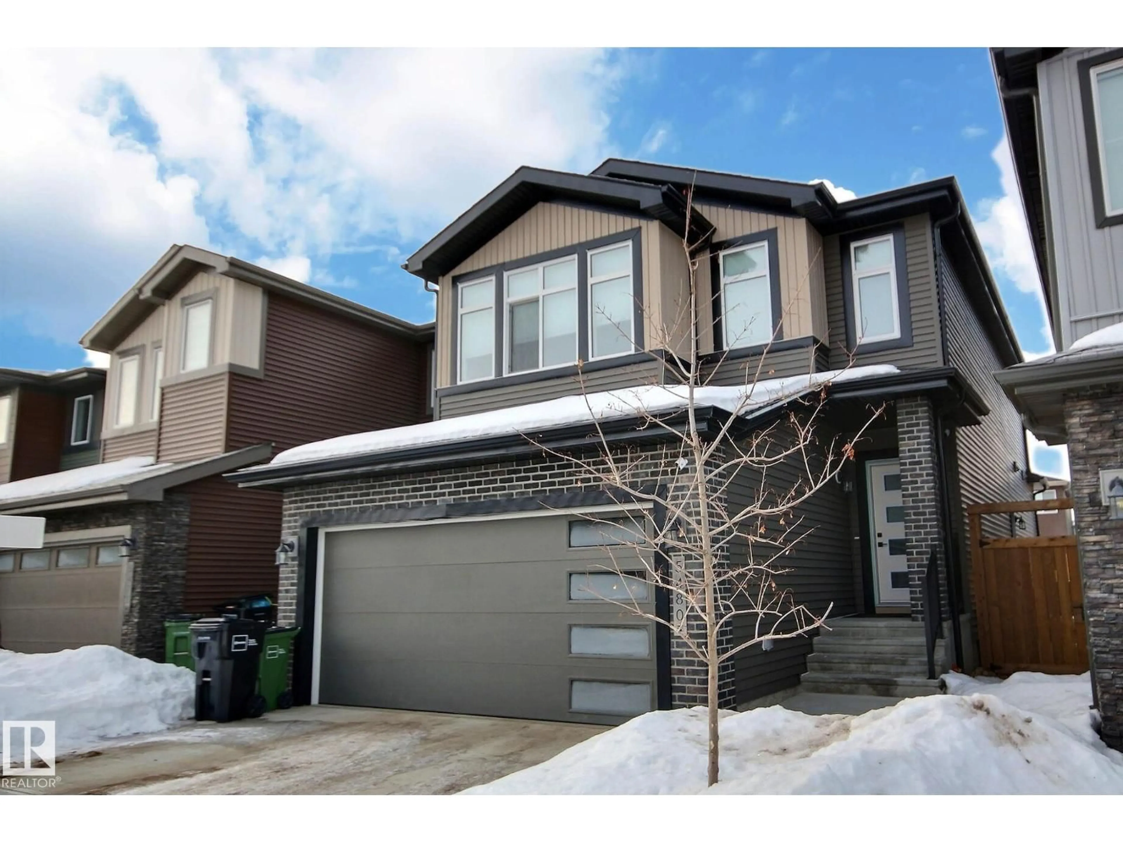 Home with brick exterior material, street for 5480 KOOTOOK RD, Edmonton Alberta T6W2Z5