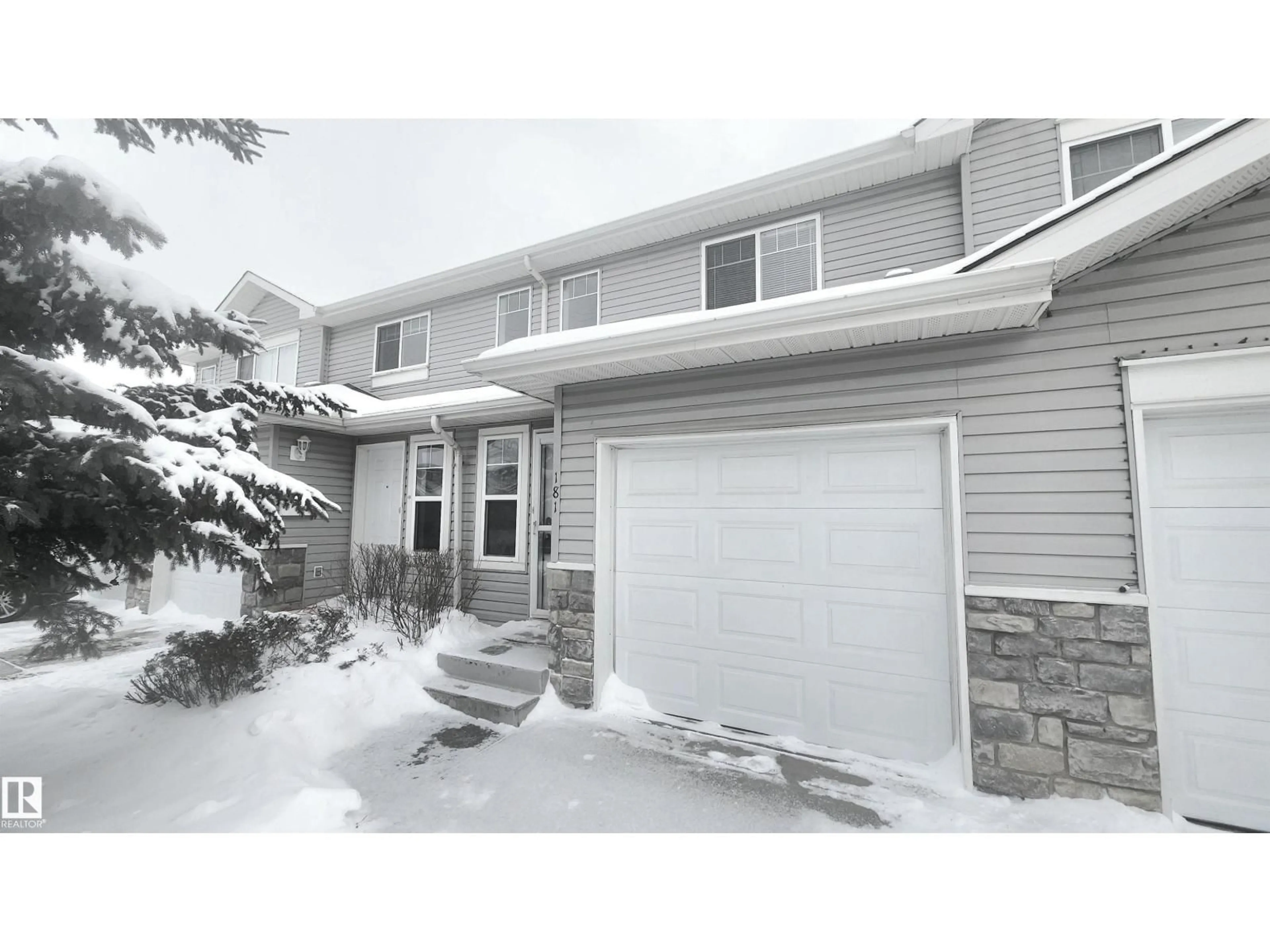 Home with vinyl exterior material, street for SW - 181 230 EDWARDS DR, Edmonton Alberta T6X1G7