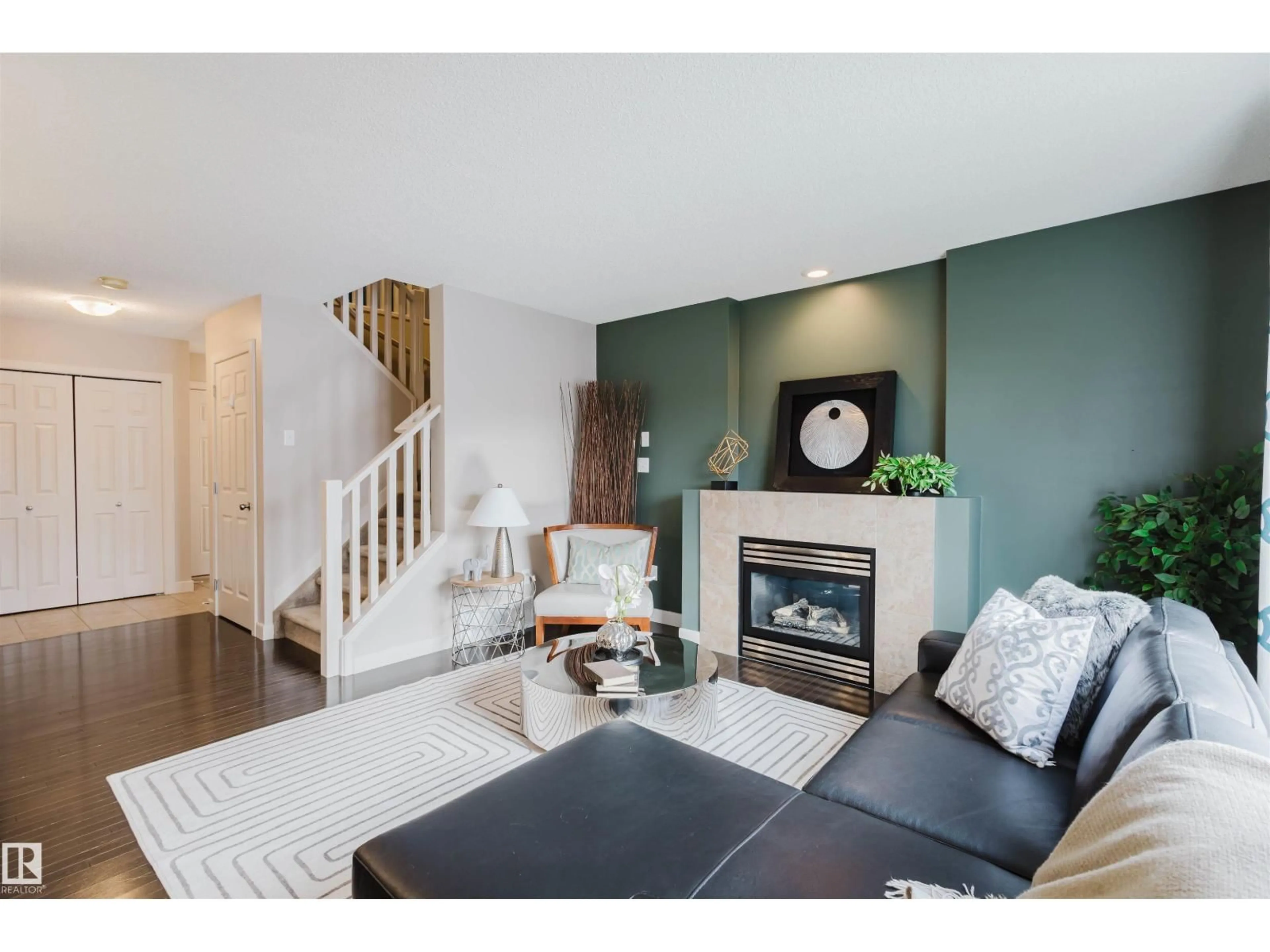 Living room with furniture, wood/laminate floor for 6069 SUNBROOK LD, Sherwood Park Alberta T8N0J7