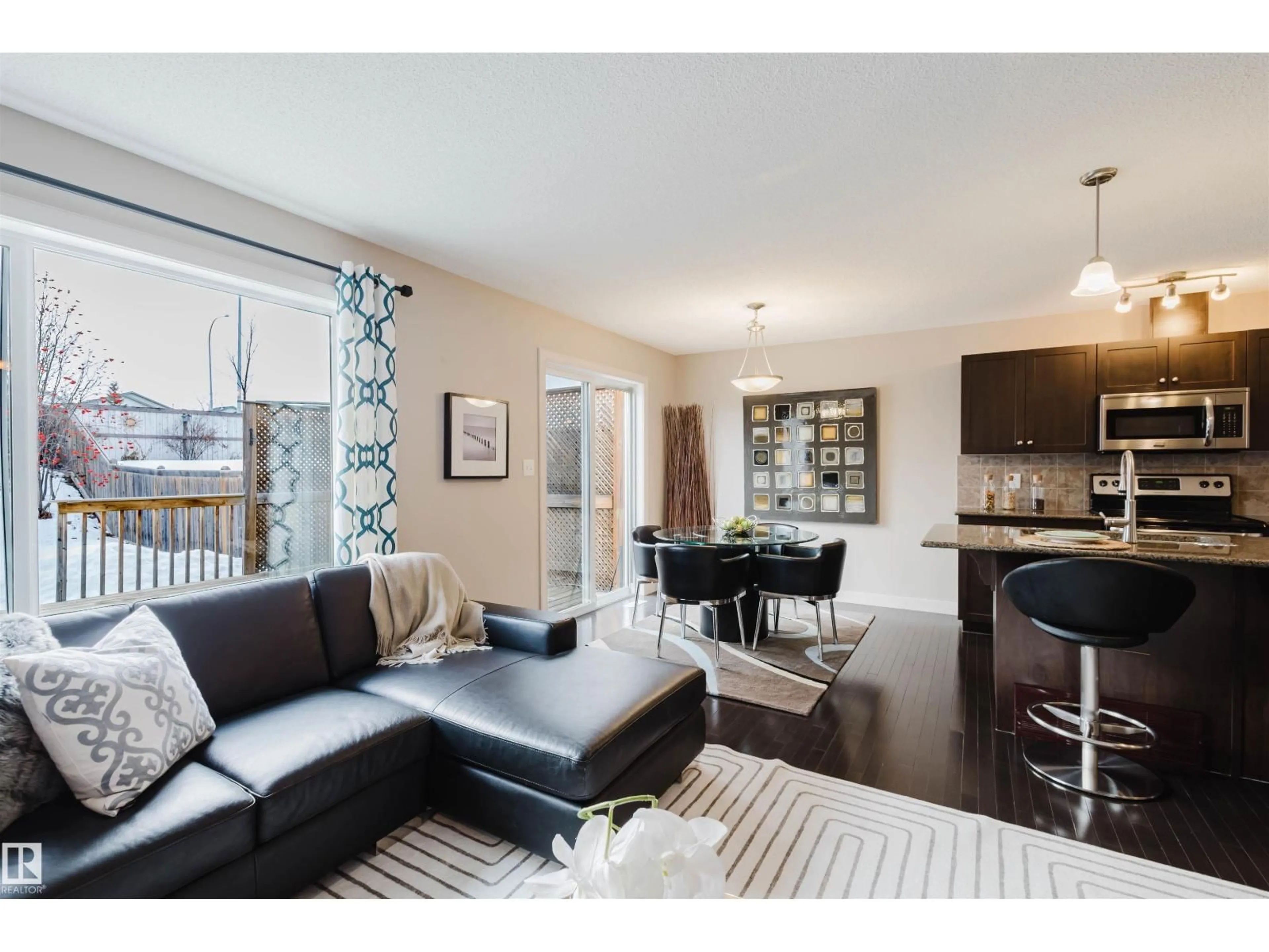 Living room with furniture, wood/laminate floor for 6069 SUNBROOK LD, Sherwood Park Alberta T8N0J7