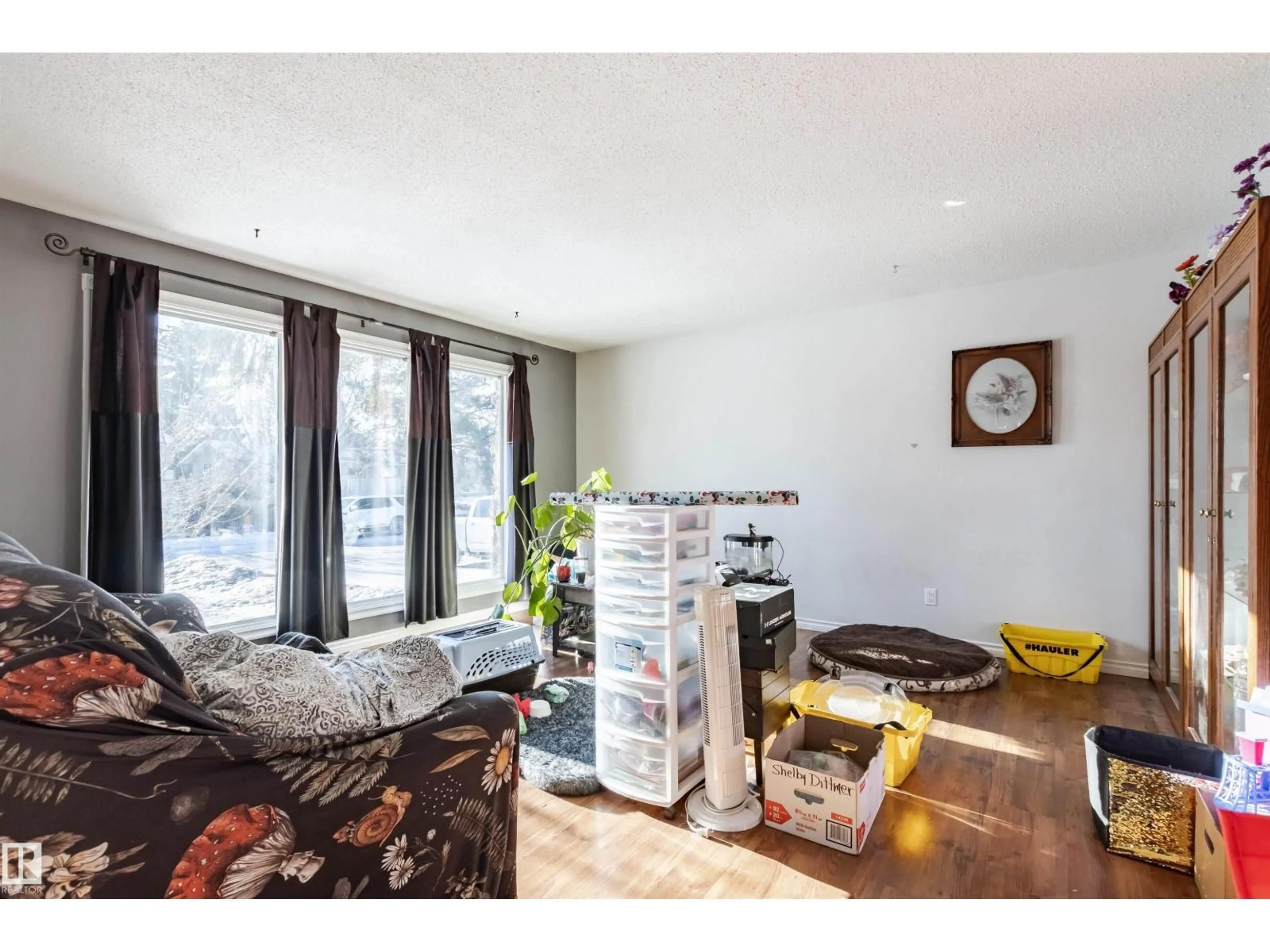 Living room with furniture, wood/laminate floor for 33 BROOKSIDE AV, Spruce Grove Alberta T7X1B6