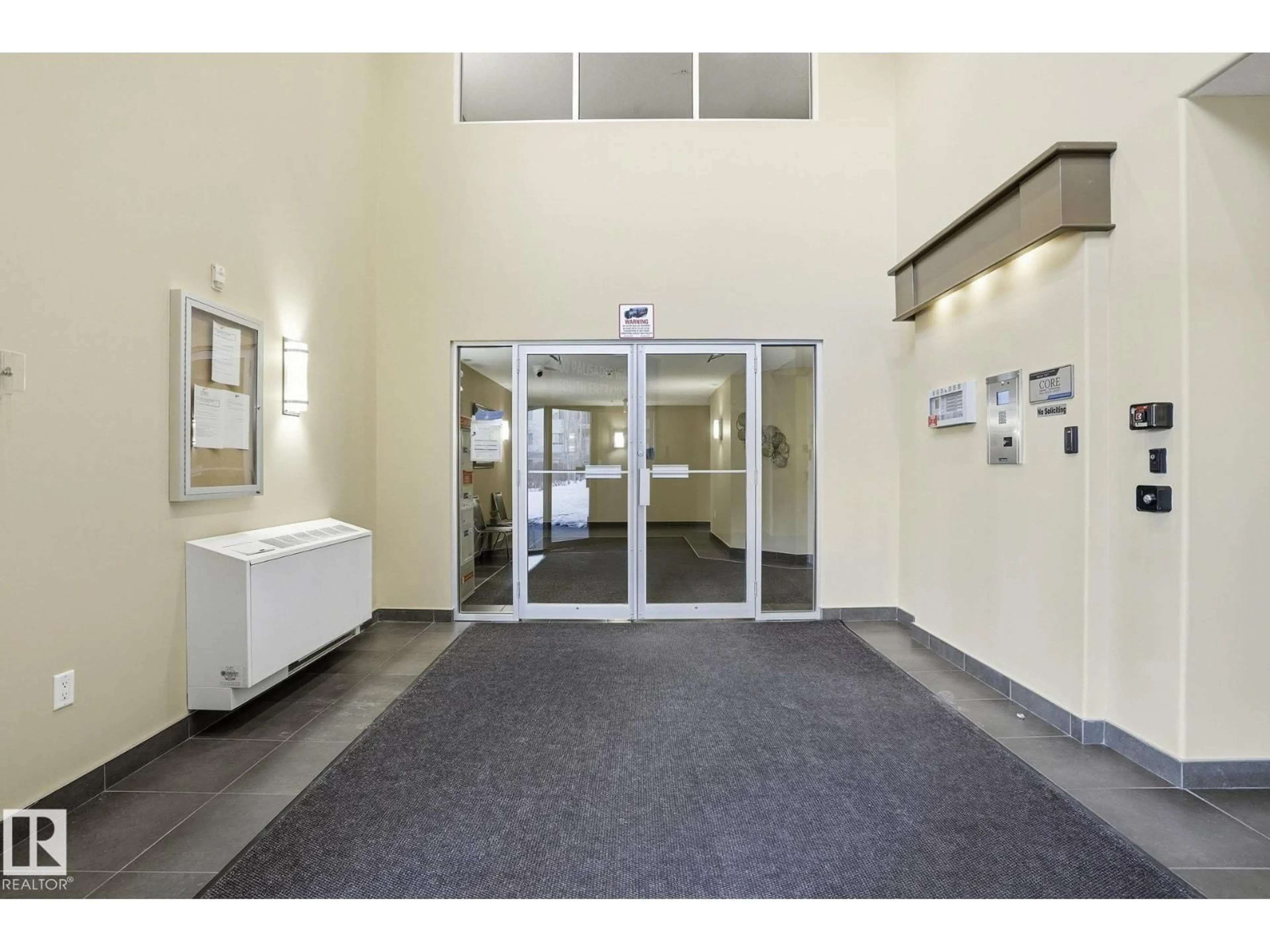 Indoor foyer for 400 - 220 PALISADES WY, Sherwood Park Alberta T8H2Y9