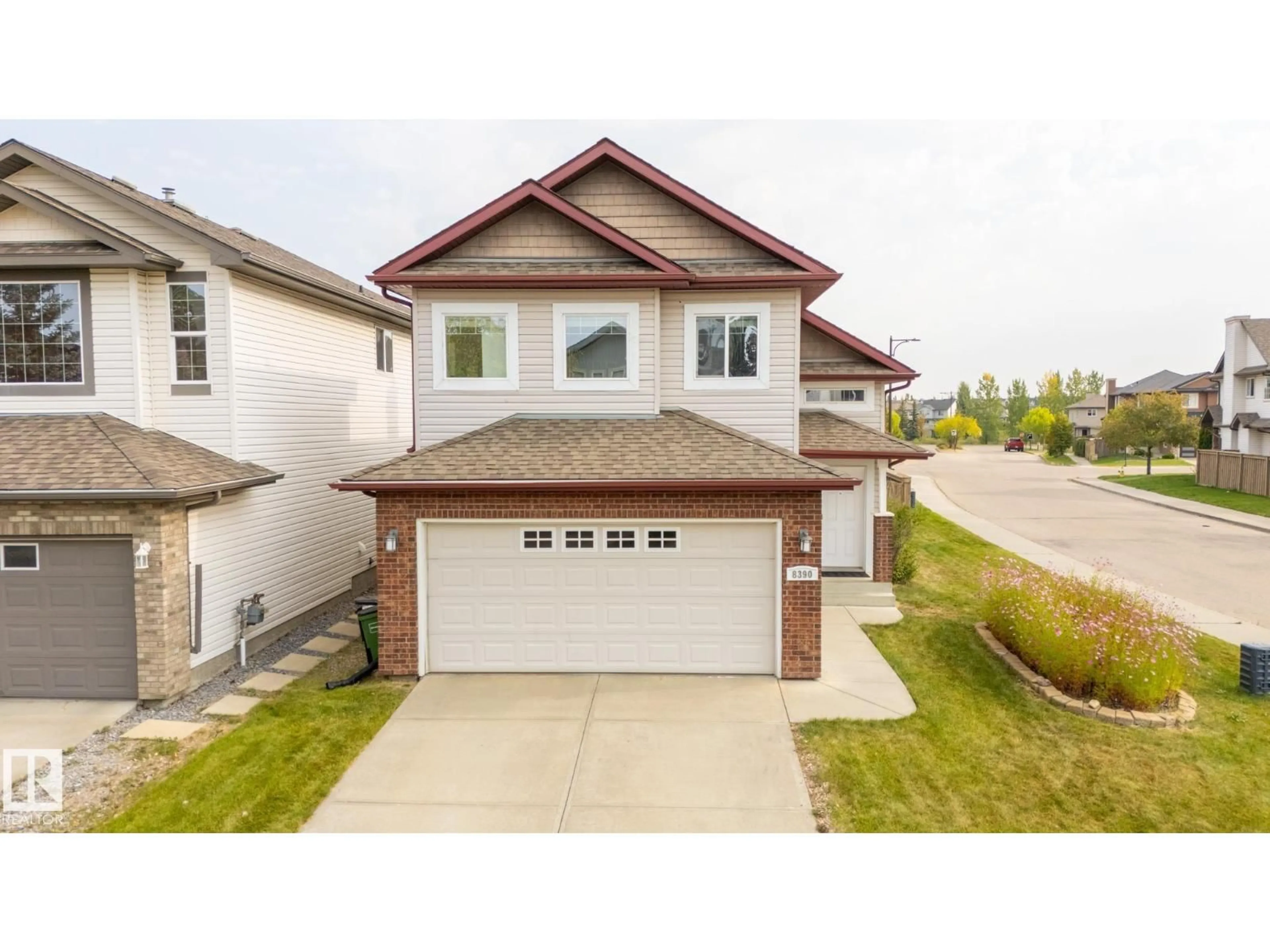 Home with vinyl exterior material, street for 8390 SHASKE CR, Edmonton Alberta T6R0B5