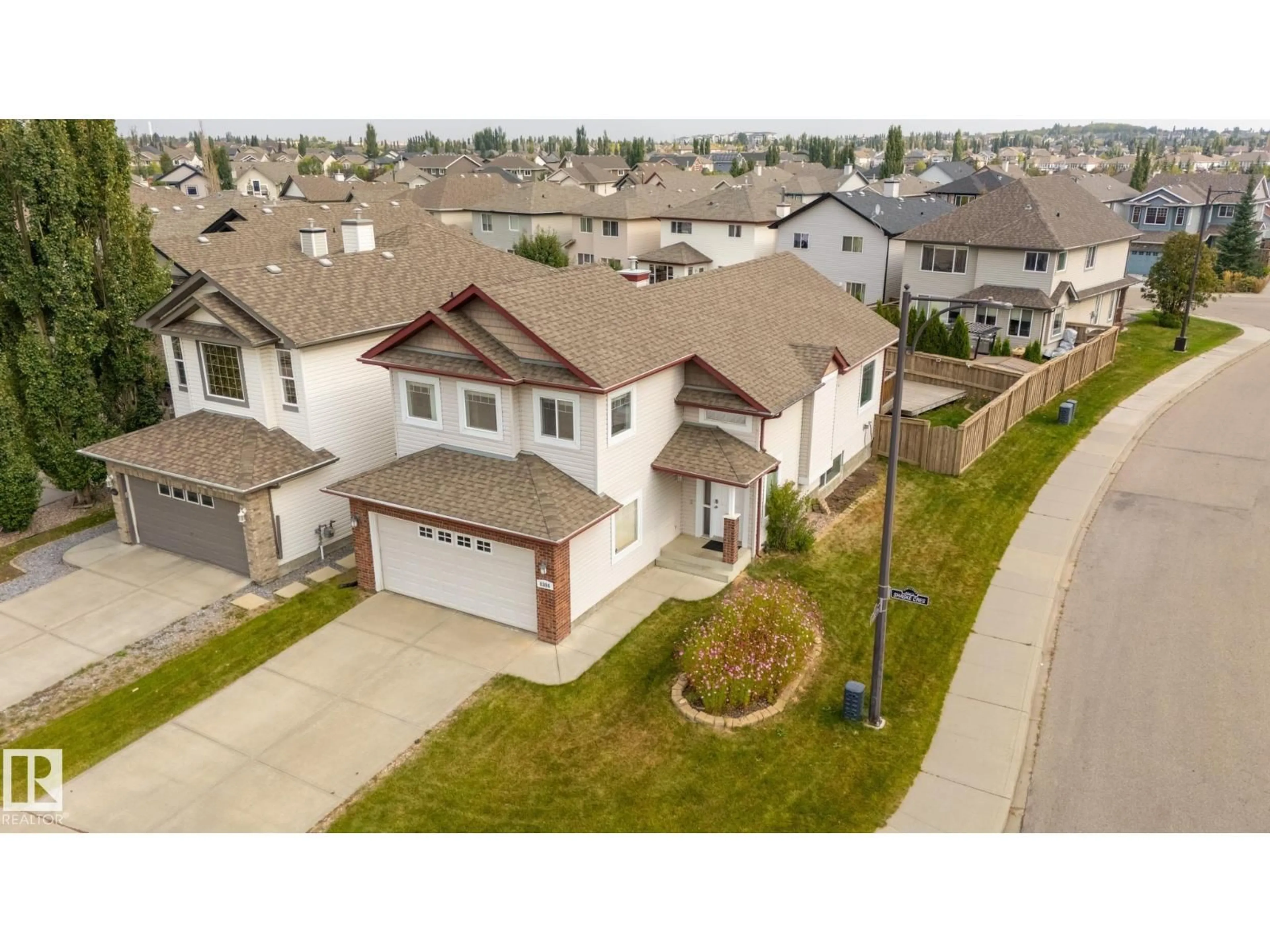 A pic from outside/outdoor area/front of a property/back of a property/a pic from drone, street for 8390 SHASKE CR, Edmonton Alberta T6R0B5