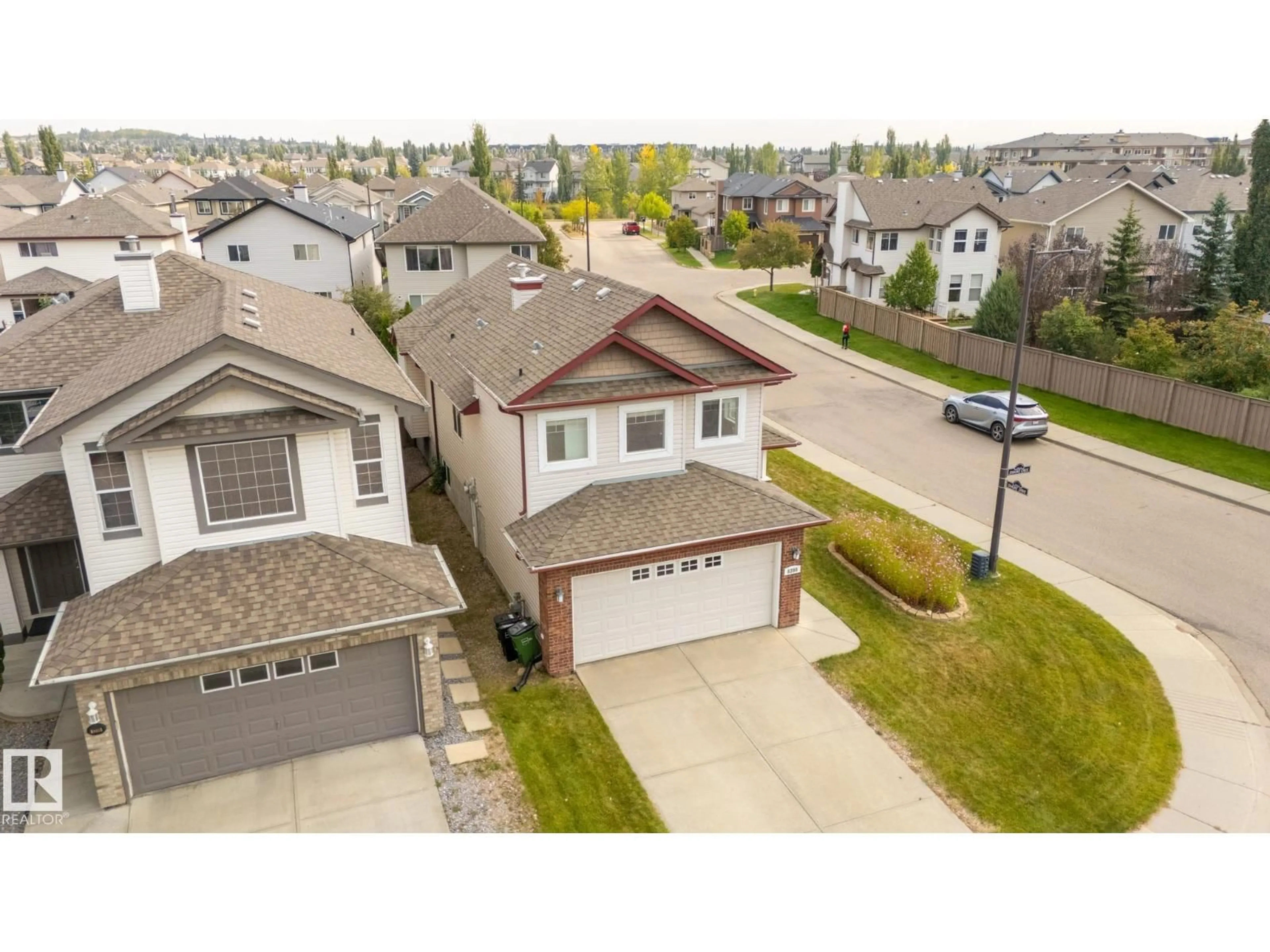 A pic from outside/outdoor area/front of a property/back of a property/a pic from drone, street for 8390 SHASKE CR, Edmonton Alberta T6R0B5