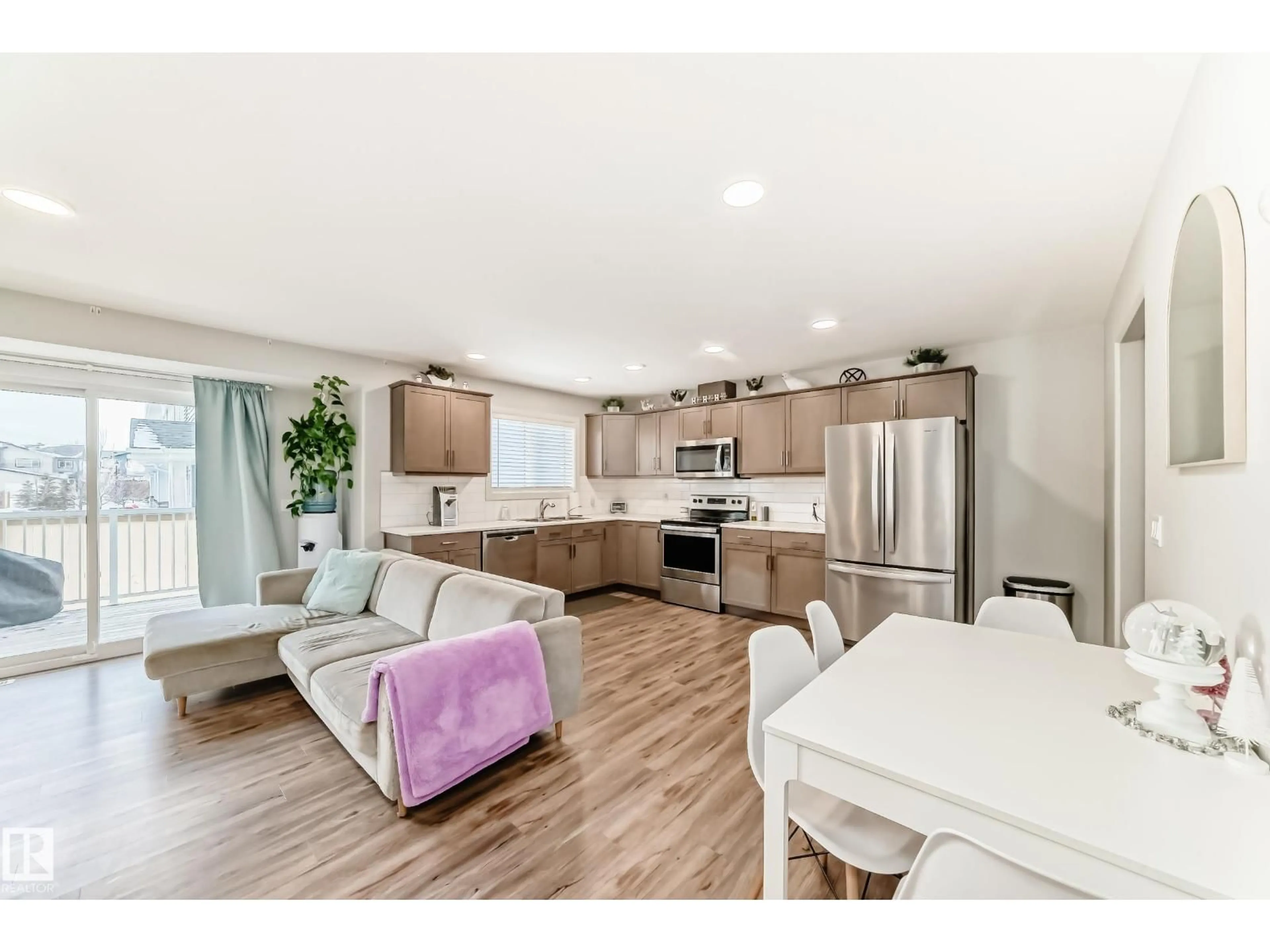 Open concept kitchen, wood/laminate floor for #102 - 300 AWENTIA DR, Leduc Alberta T9E1H3