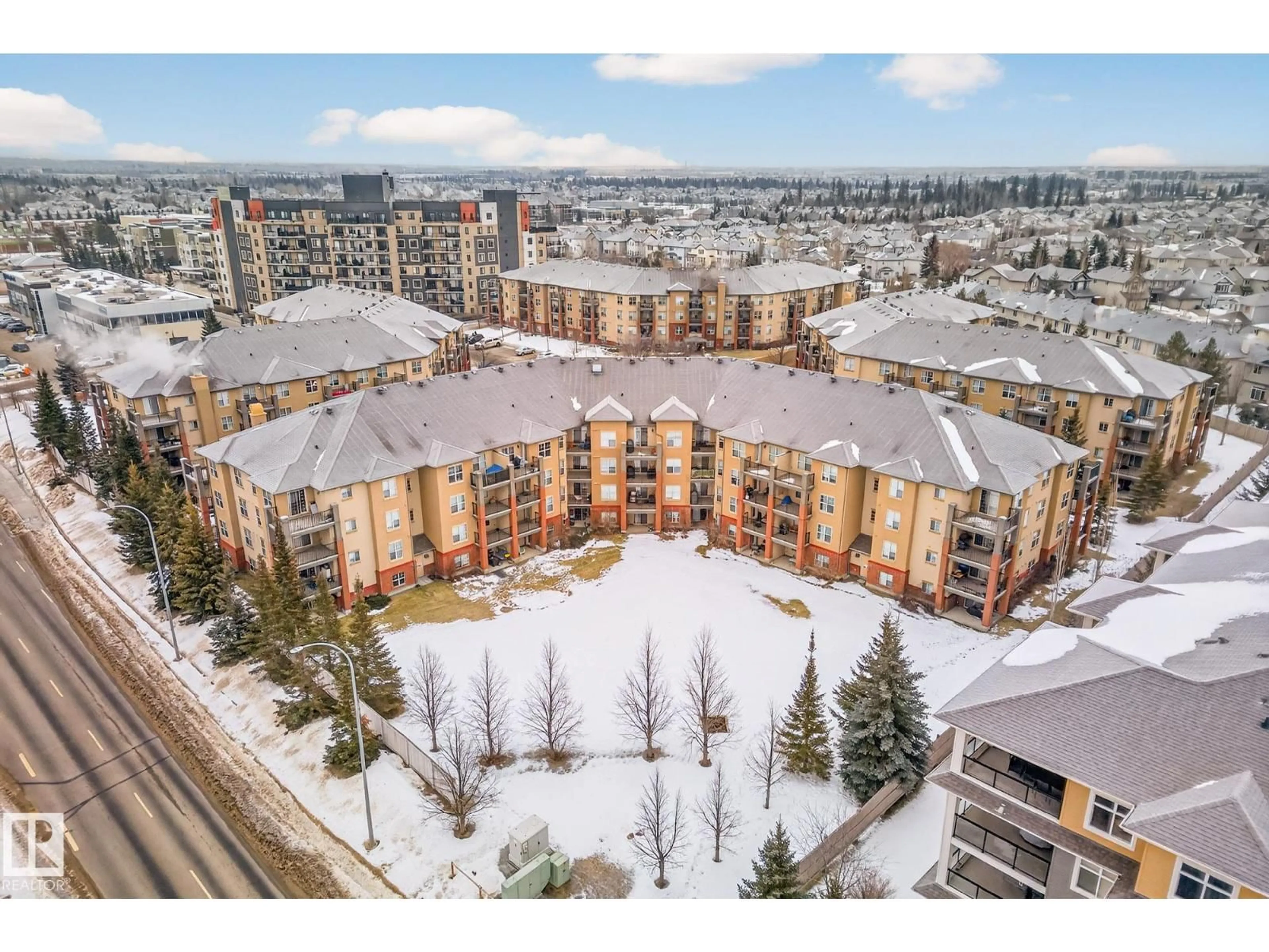 A pic from outside/outdoor area/front of a property/back of a property/a pic from drone, mountain view for #102 - 11445 ELLERSLIE RD SW, Edmonton Alberta T5W1T1
