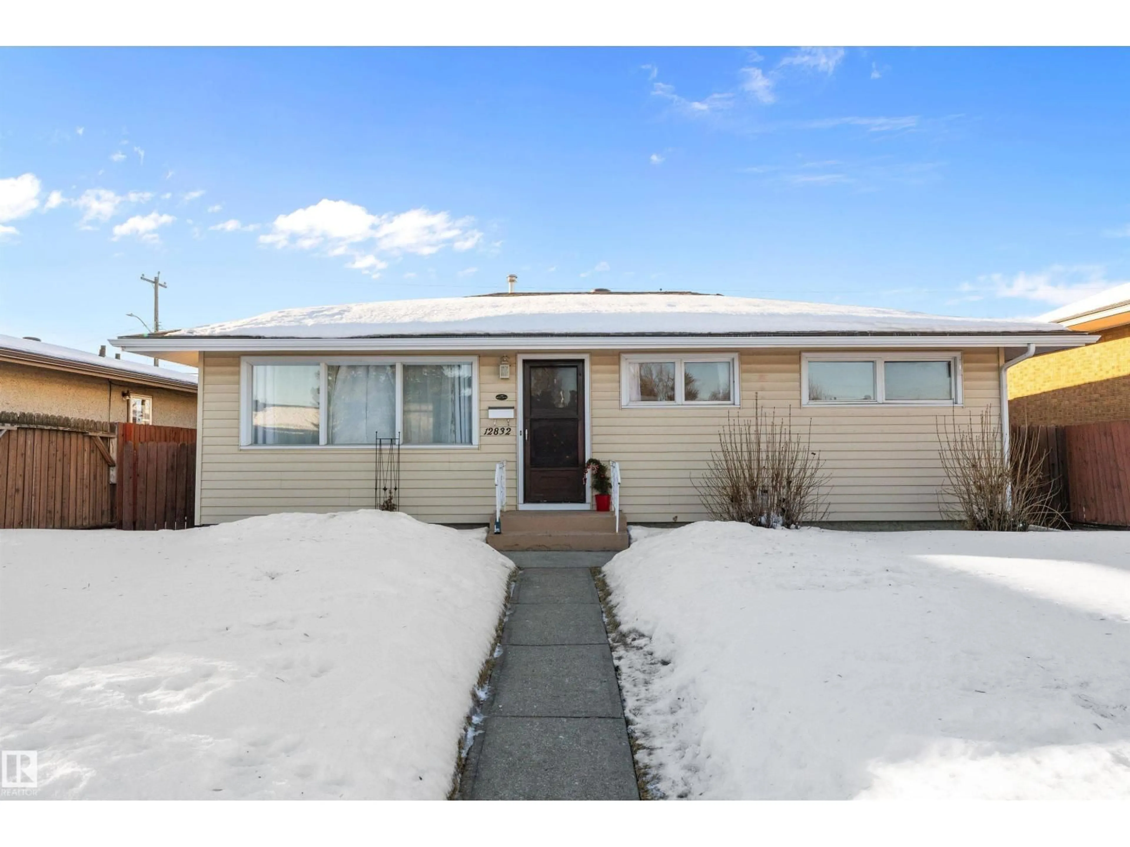 Home with vinyl exterior material, street for NW - 12832 134 ST, Edmonton Alberta T5L1V4