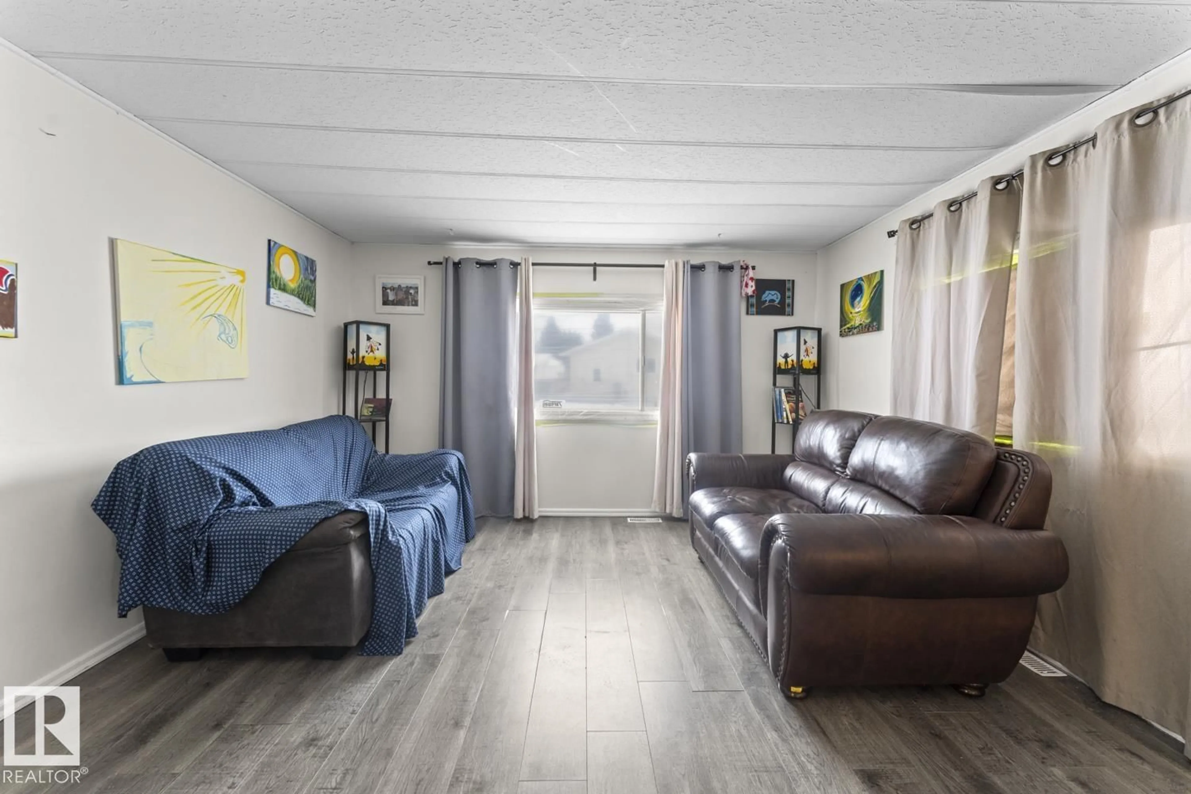 Living room with furniture, unknown for 5612 53 AV, Cold Lake Alberta T9M1R8