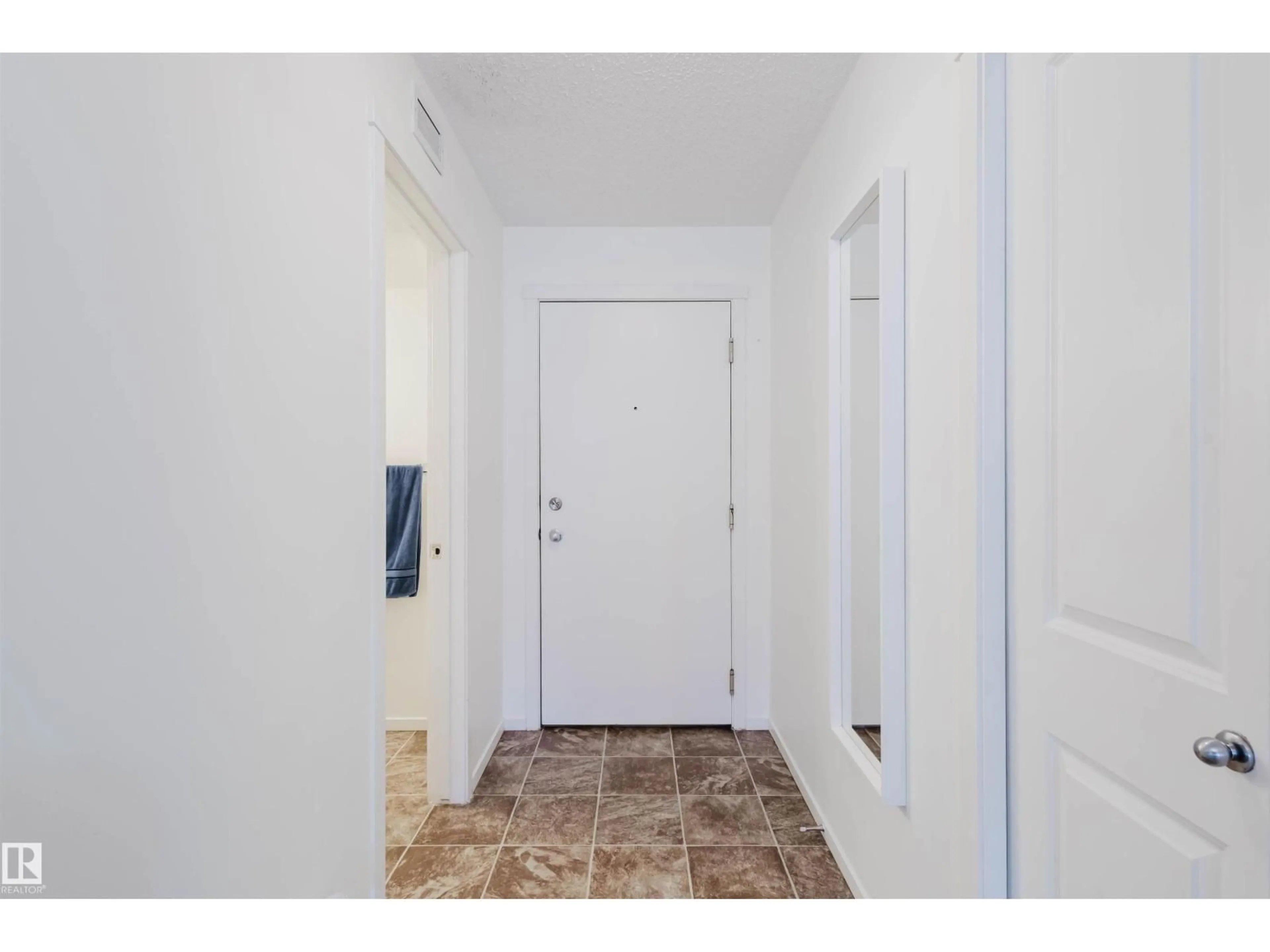 Indoor entryway for #313 - 5816 MULLEN PL, Edmonton Alberta T6R0W3